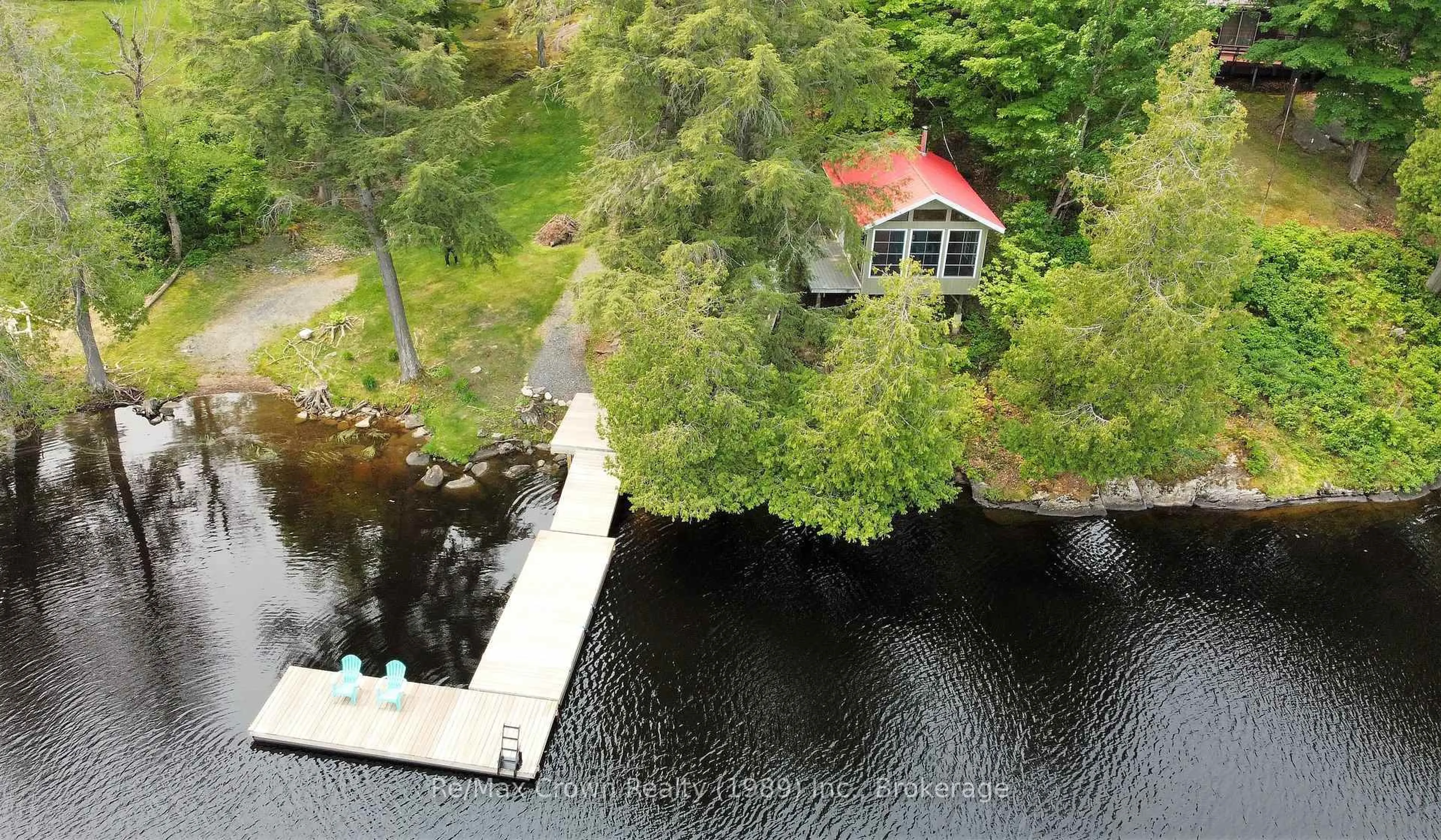 A pic from outside/outdoor area/front of a property/back of a property/a pic from drone, water/lake/river/ocean view for 108 Murphy Dr, Parry Sound Remote Area Ontario P0H 1N0