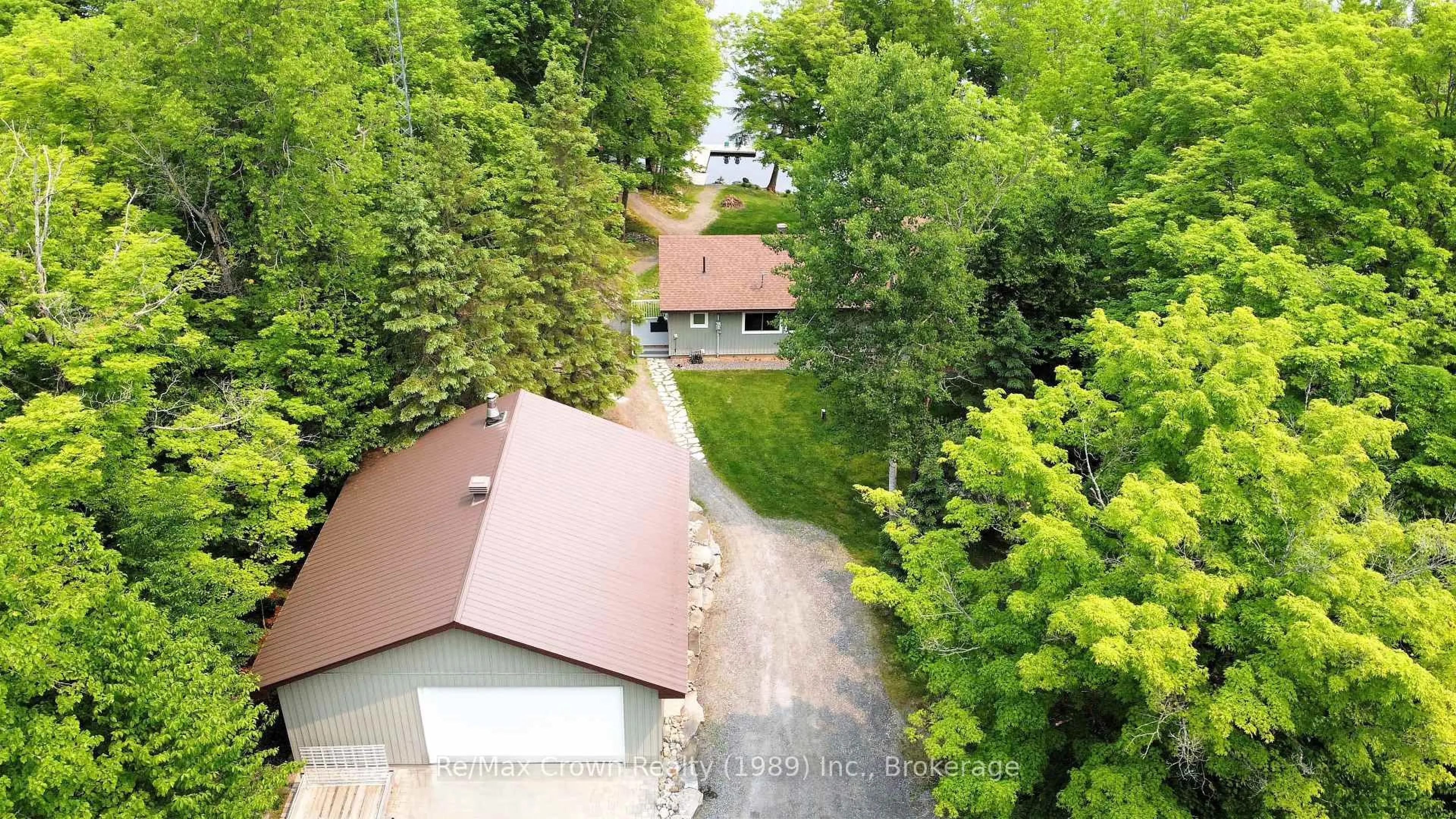 A pic from outside/outdoor area/front of a property/back of a property/a pic from drone, forest/trees view for 108 Murphy Dr, Parry Sound Remote Area Ontario P0H 1N0