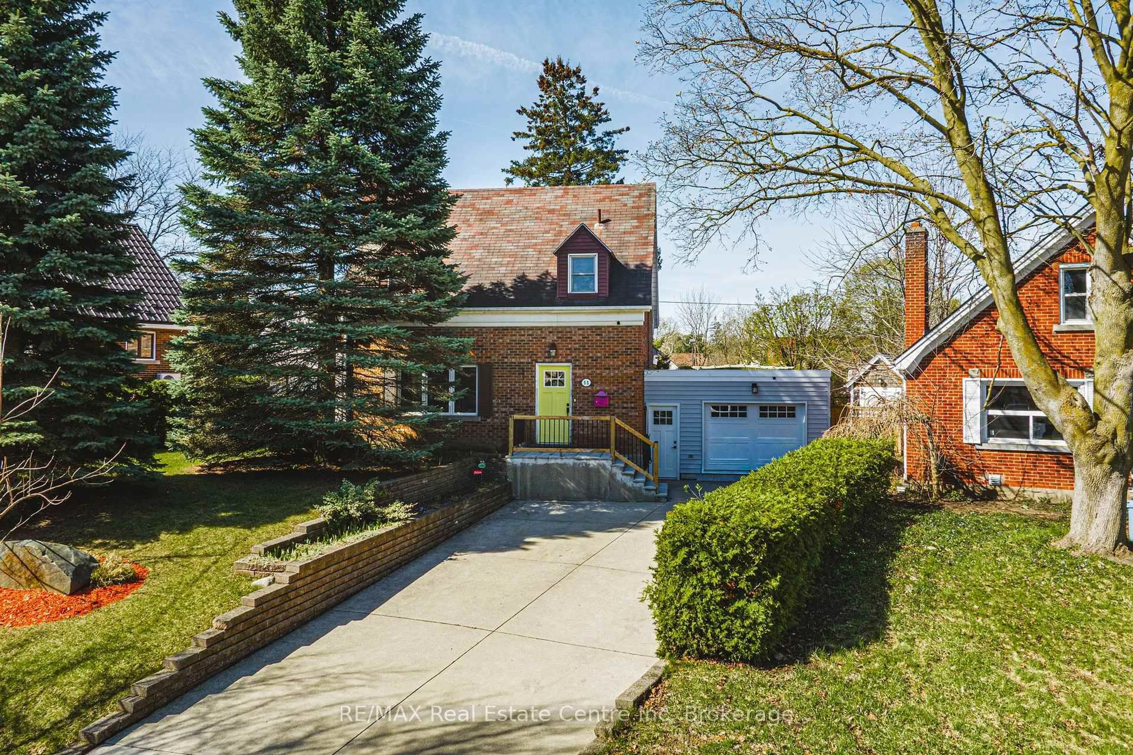 Home with brick exterior material, street for 55 Vancamp Ave, Kitchener Ontario N2M 1J1