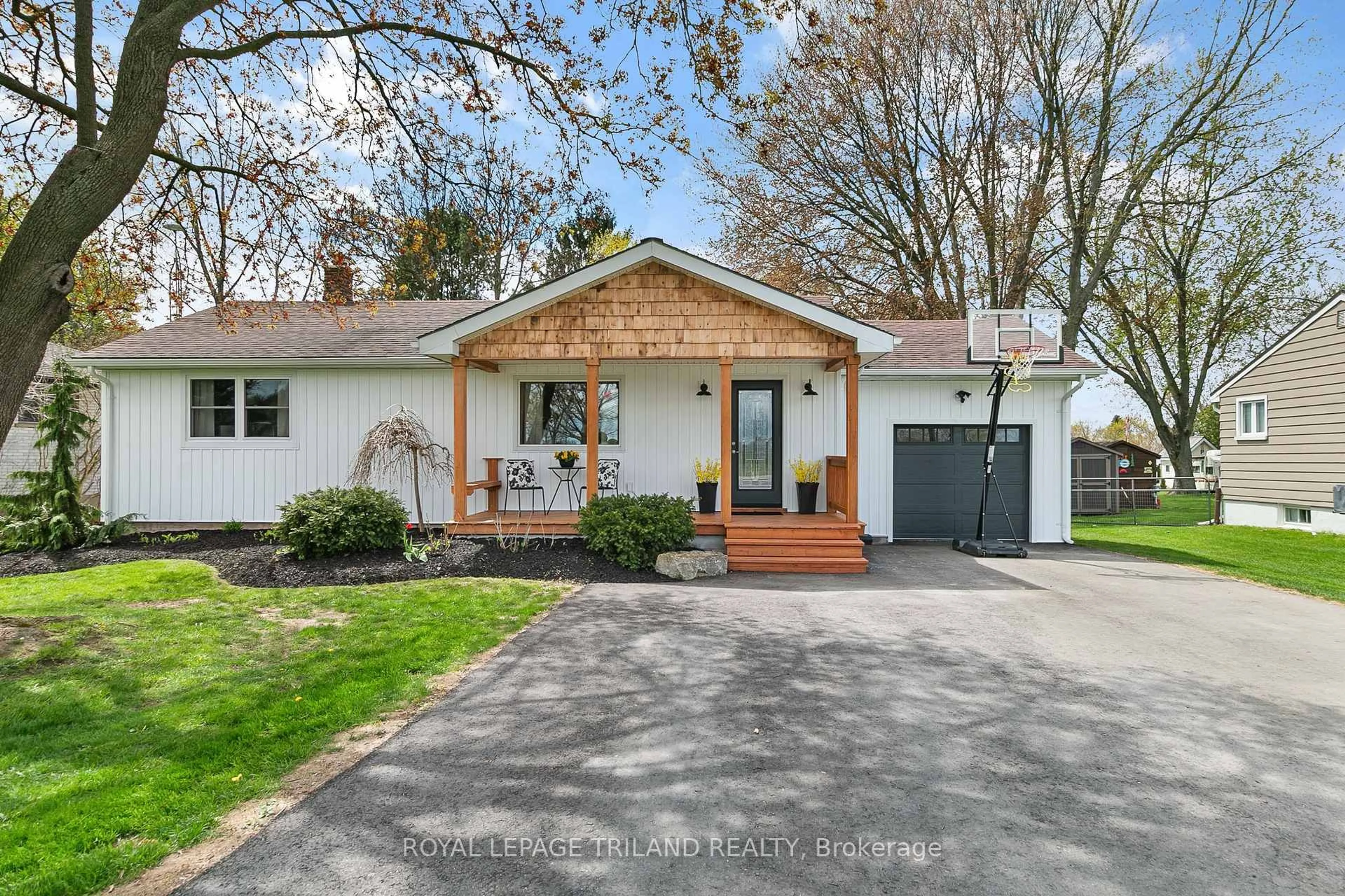 Home with vinyl exterior material, street for 298 Sunset Dr, Central Elgin Ontario N5R 3C5
