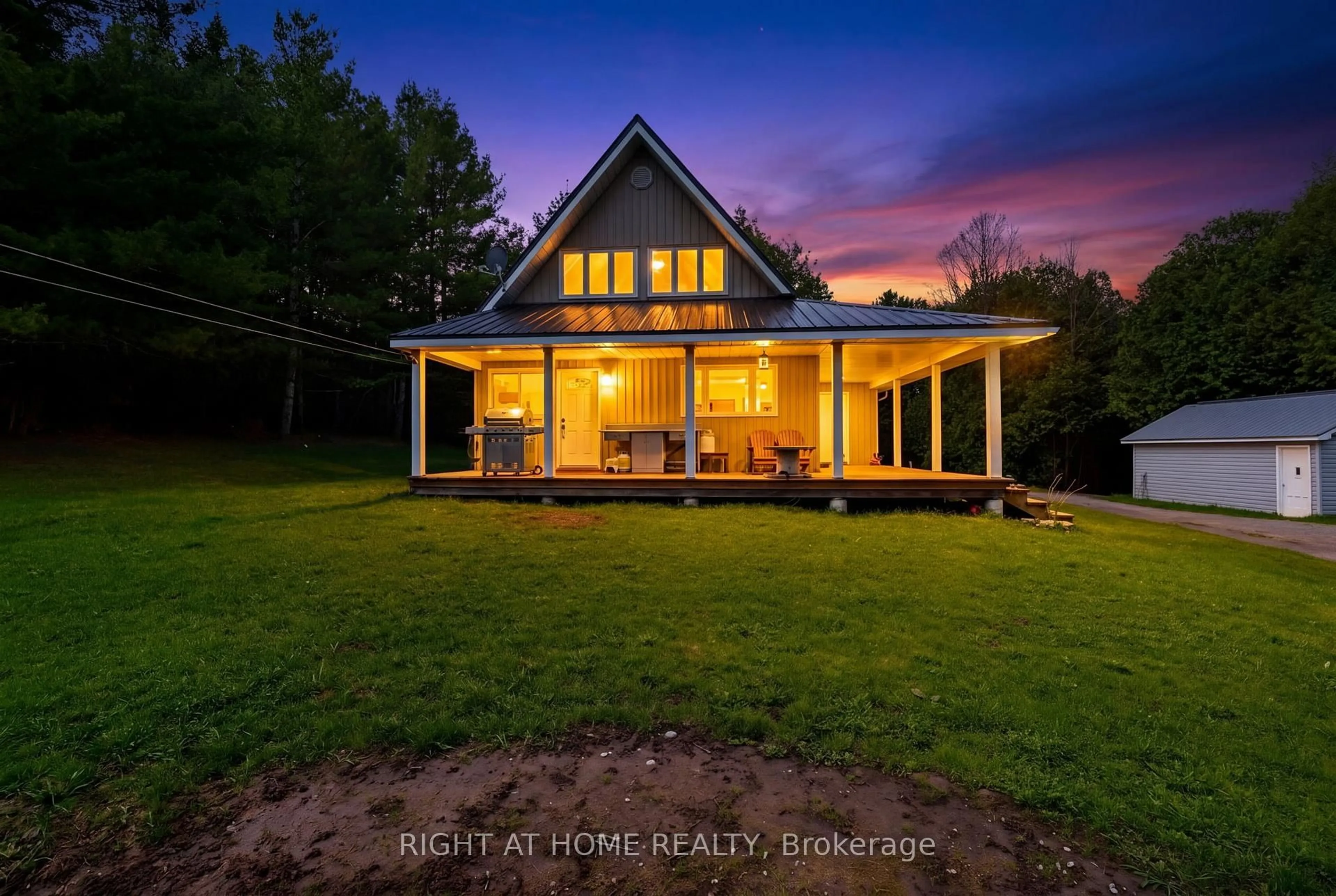 A pic from outside/outdoor area/front of a property/back of a property/a pic from drone, water/lake/river/ocean view for 636671 Euphrasia-Holland Townline, Grey Highlands Ontario N0C 1H0