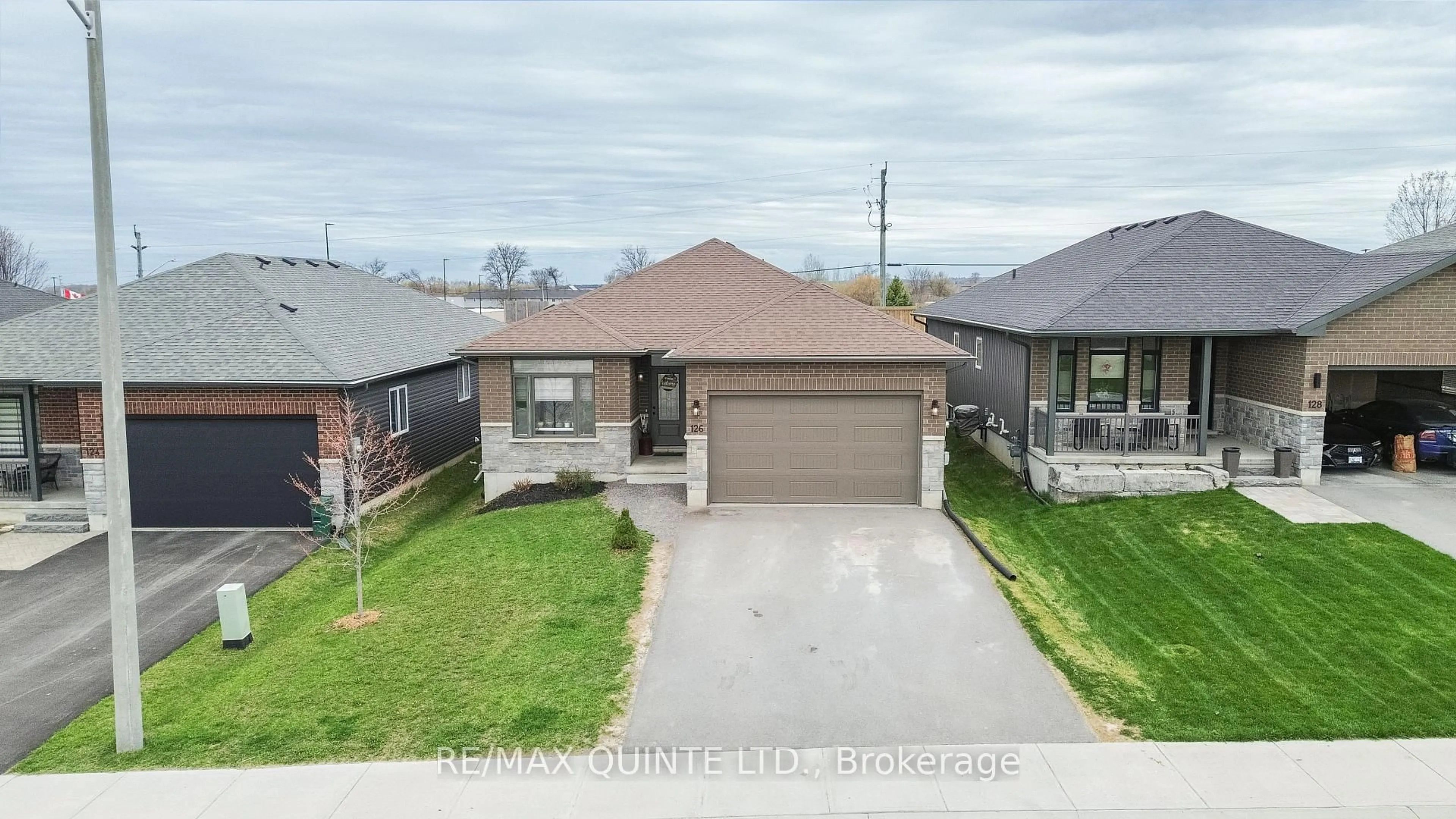 A pic from outside/outdoor area/front of a property/back of a property/a pic from drone, street for 126 Northumberland Blvd, Quinte West Ontario K8V 6W2