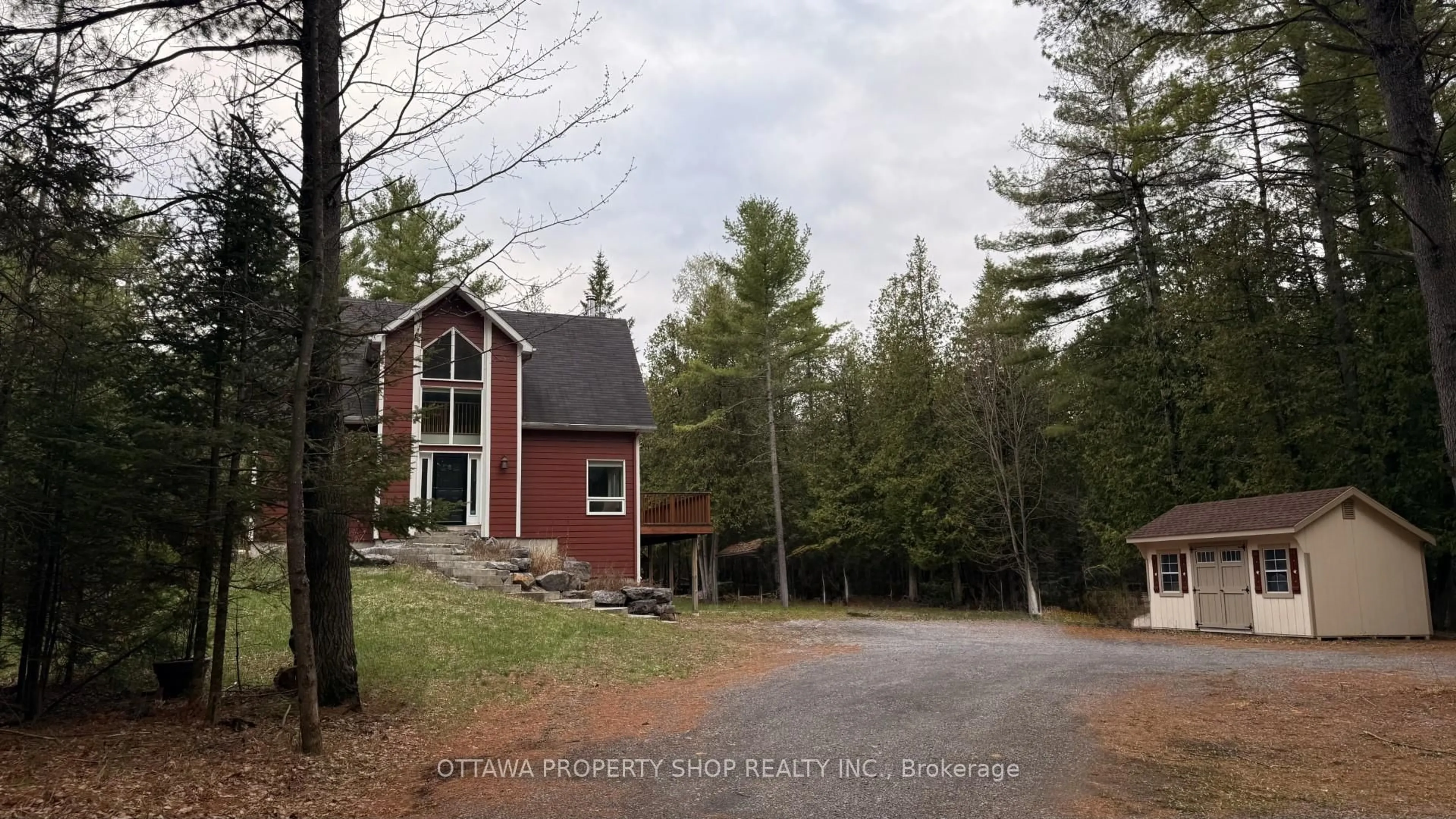 A pic from outside/outdoor area/front of a property/back of a property/a pic from drone, unknown for 927 Spruce Ridge Rd, Carp Ontario K0A 1L0