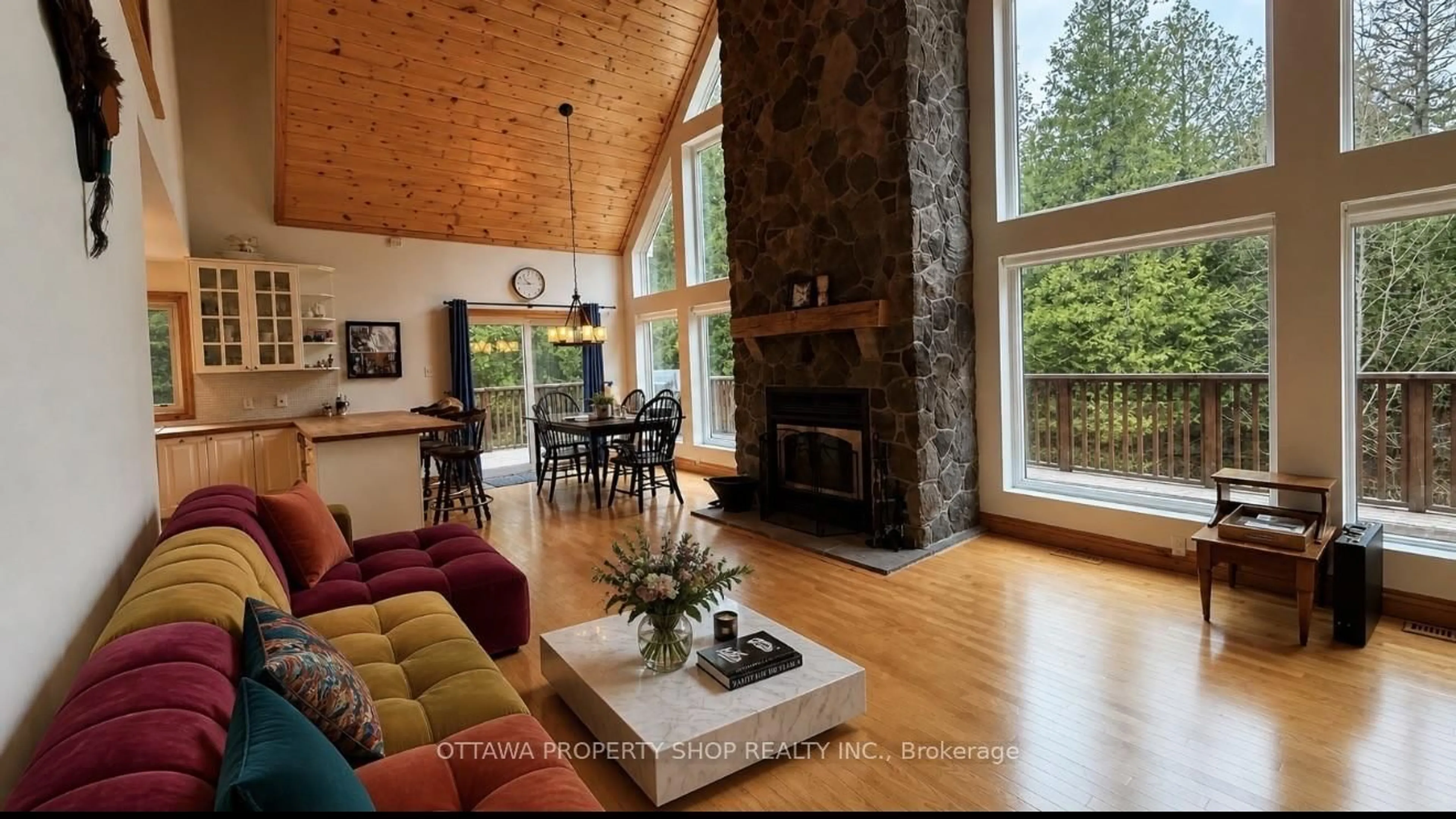 Living room with furniture, wood/laminate floor for 927 Spruce Ridge Rd, Carp Ontario K0A 1L0