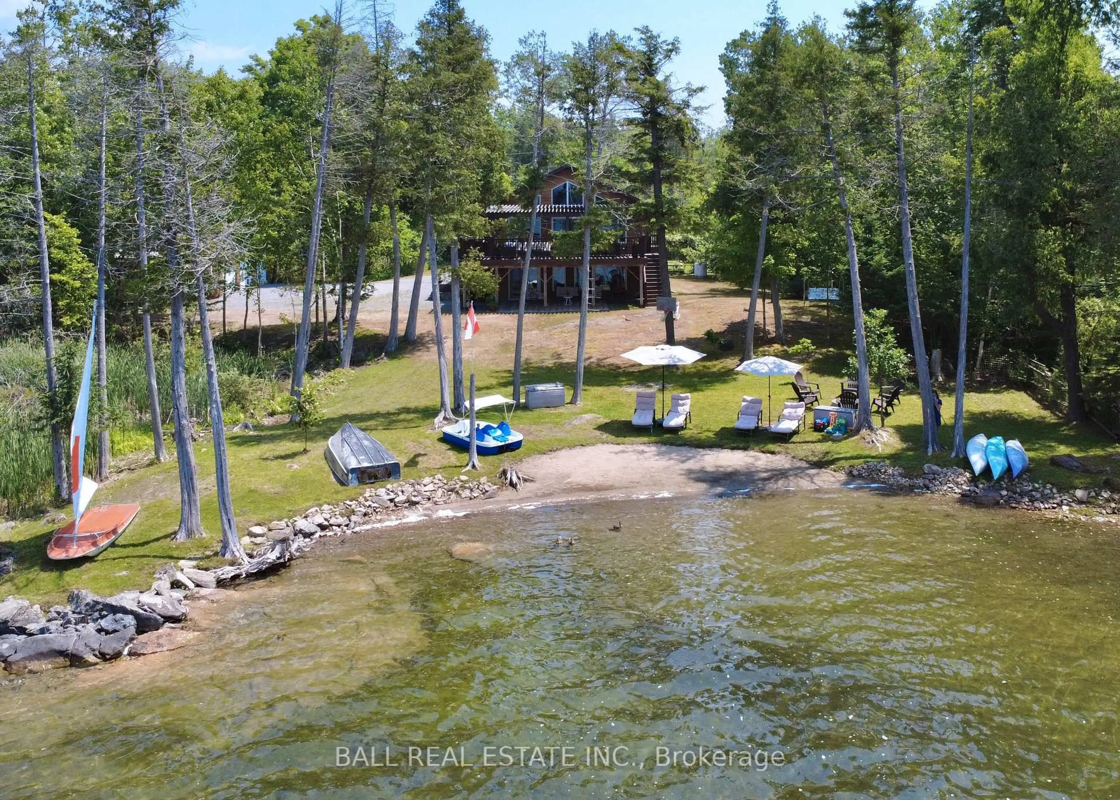 A pic from outside/outdoor area/front of a property/back of a property/a pic from drone, water/lake/river/ocean view for 154 JULIAN LAKE Rd, North Kawartha Ontario K0L 3E0