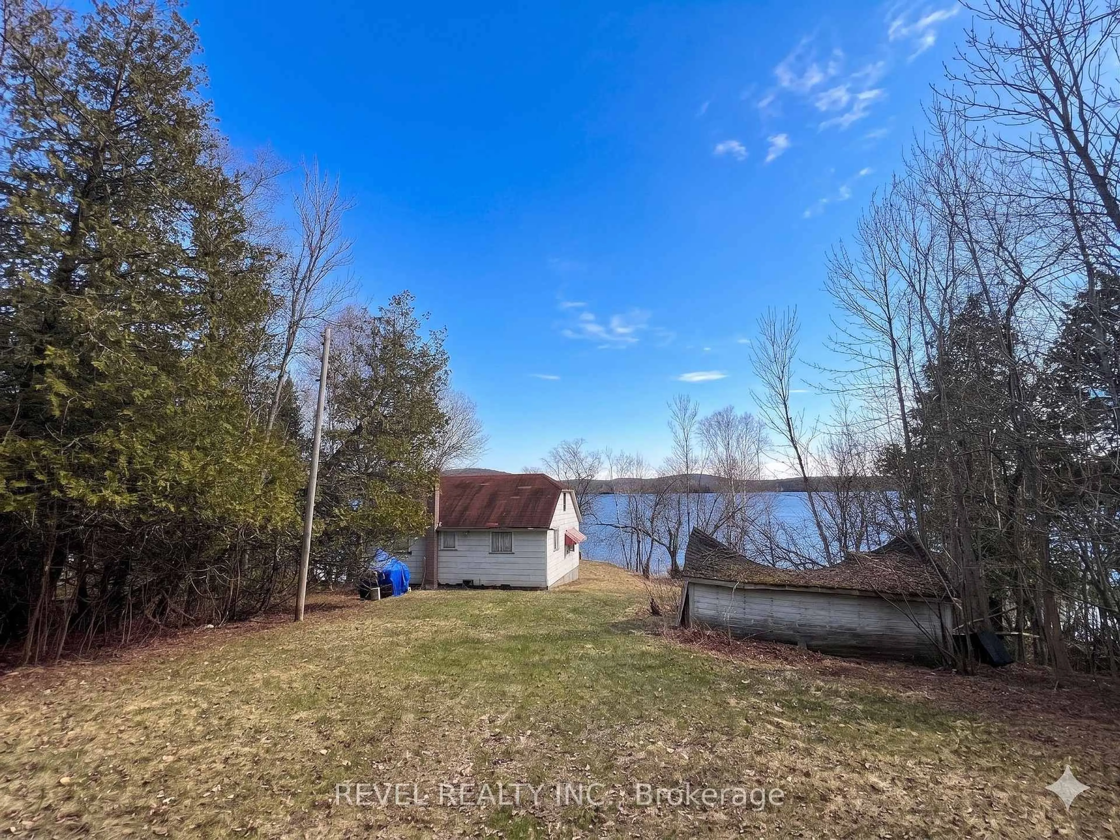 A pic from outside/outdoor area/front of a property/back of a property/a pic from drone, water/lake/river/ocean view for 80 Cove Rd, Armour Ontario P0A 1L0