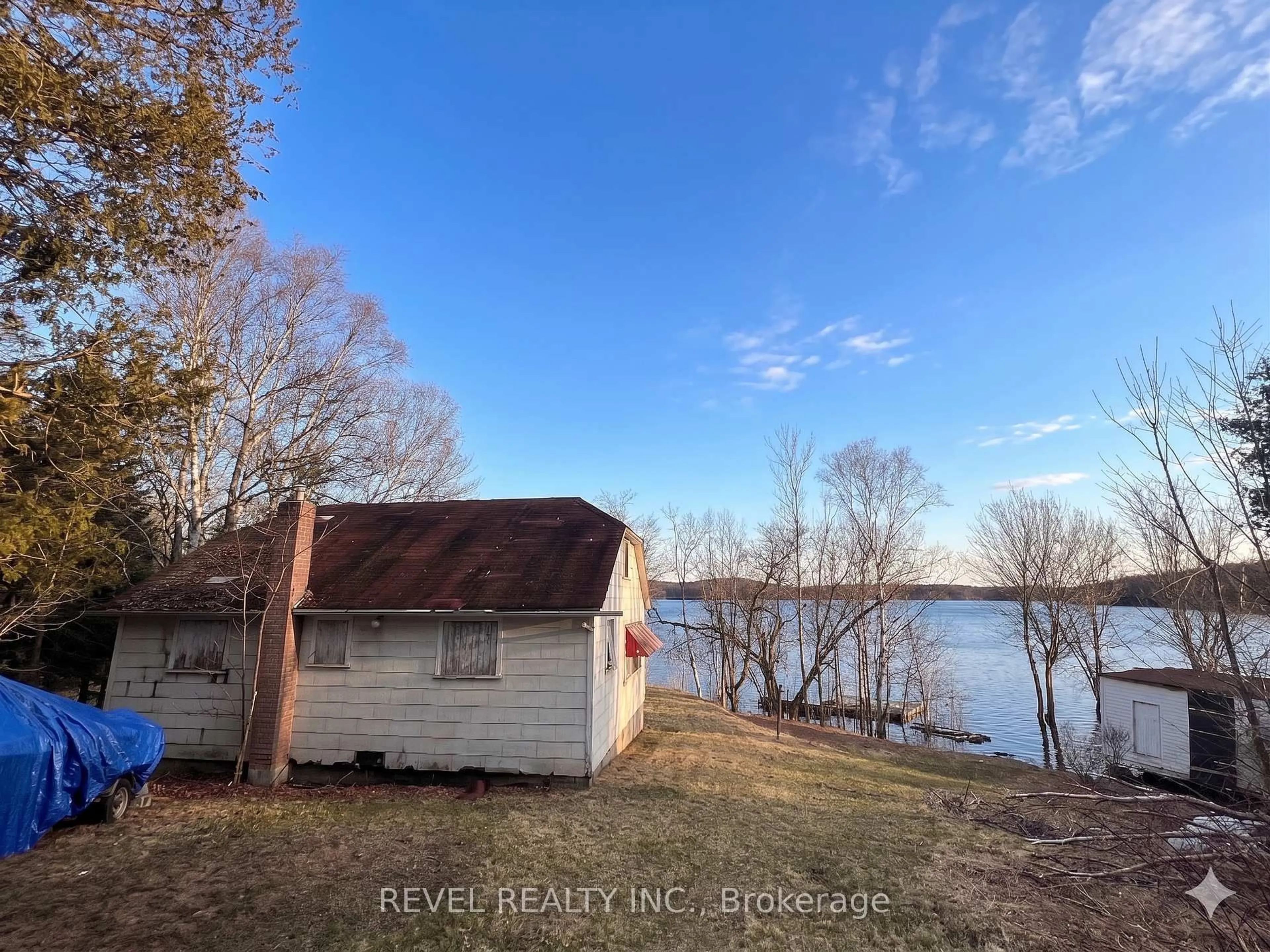 A pic from outside/outdoor area/front of a property/back of a property/a pic from drone, water/lake/river/ocean view for 80 Cove Rd, Armour Ontario P0A 1L0