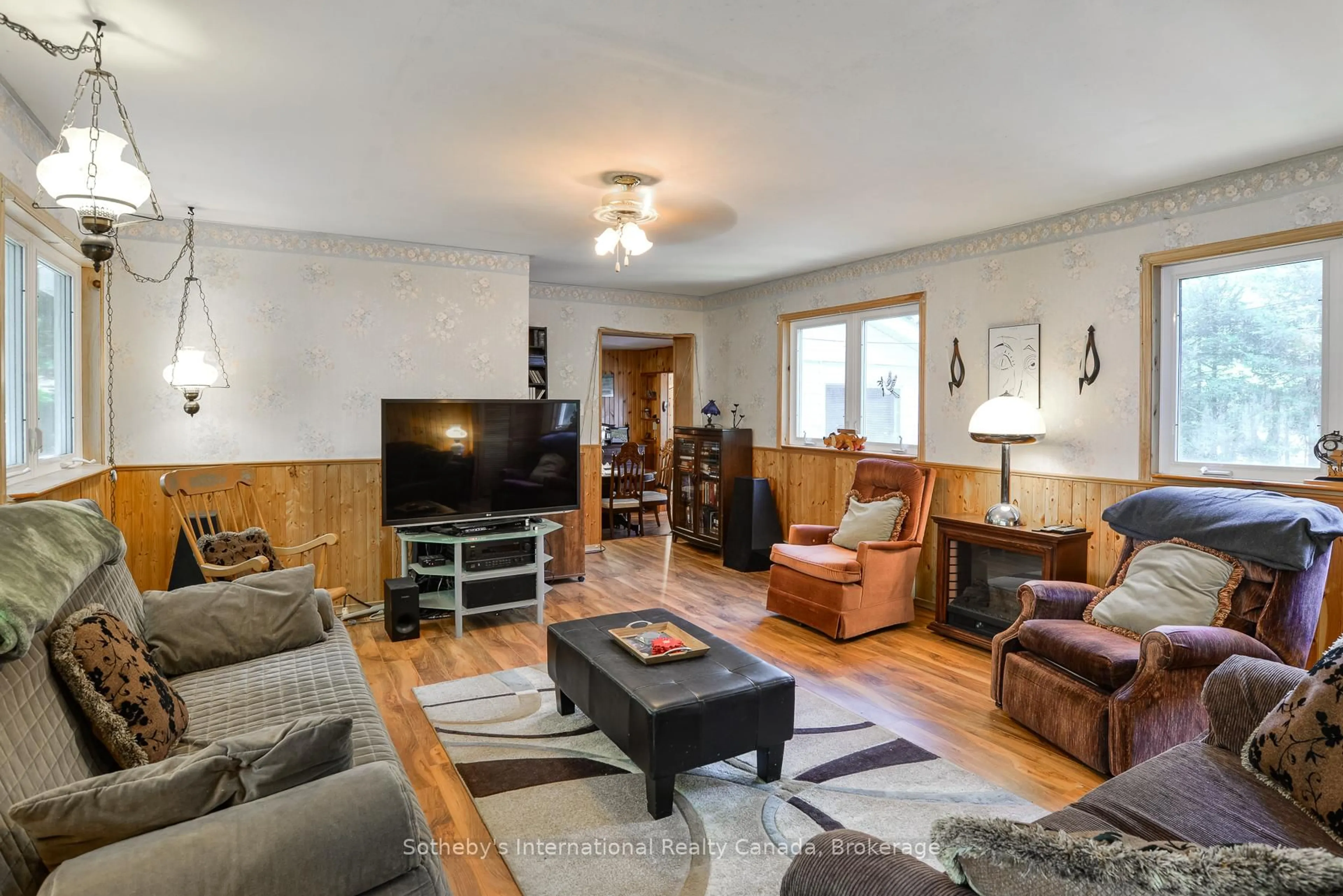 Living room with furniture, wood/laminate floor for 1145 South Morrison Lake Rd, Gravenhurst Ontario P0E 1G0