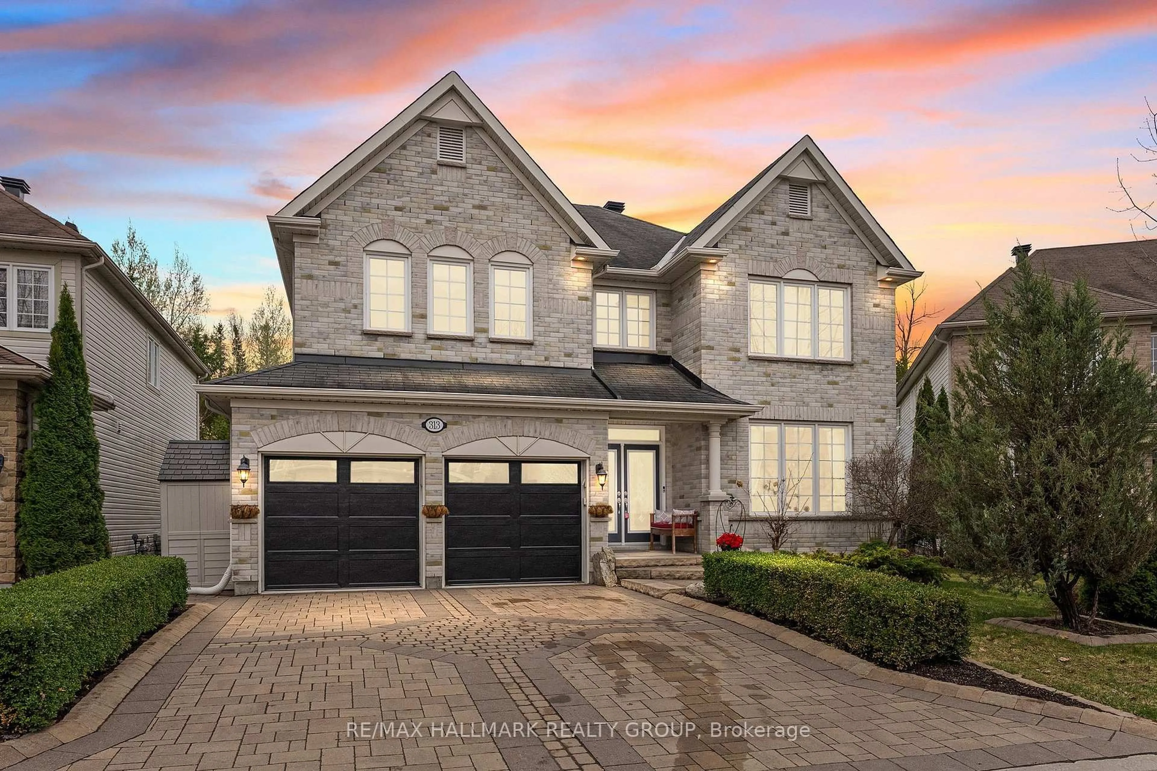 Home with brick exterior material, street for 313 Eckerson Ave, Ottawa Ontario K2S 0K8