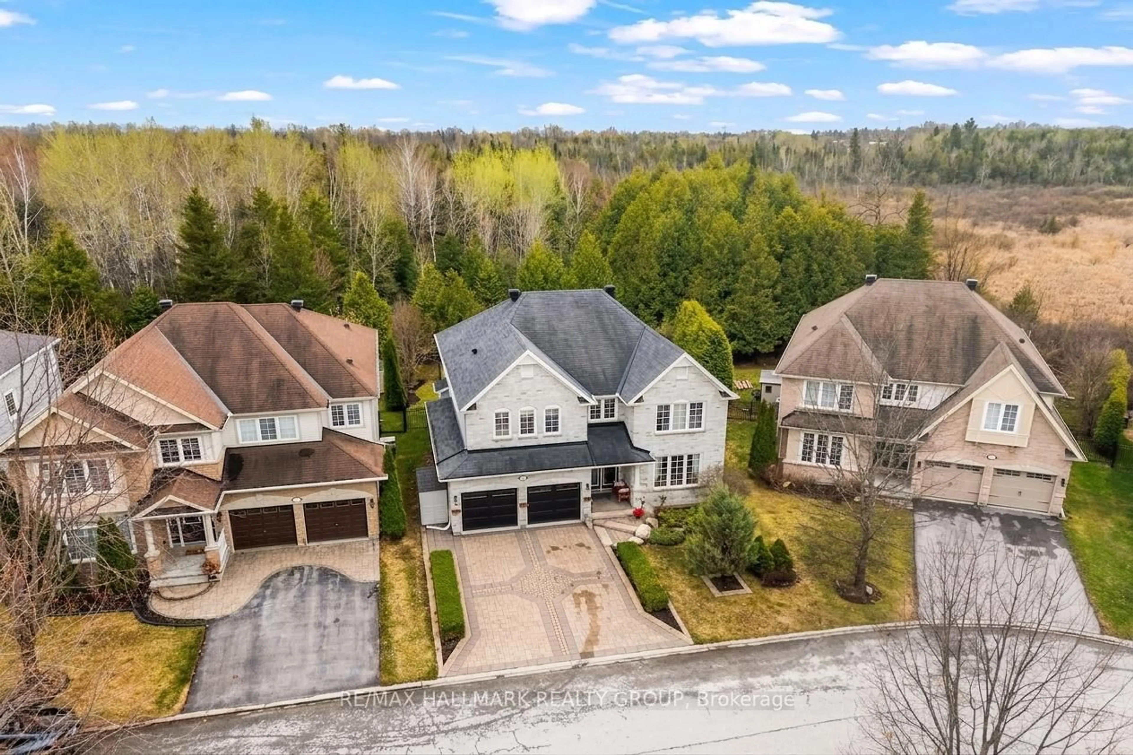 A pic from outside/outdoor area/front of a property/back of a property/a pic from drone, street for 313 Eckerson Ave, Ottawa Ontario K2S 0K8