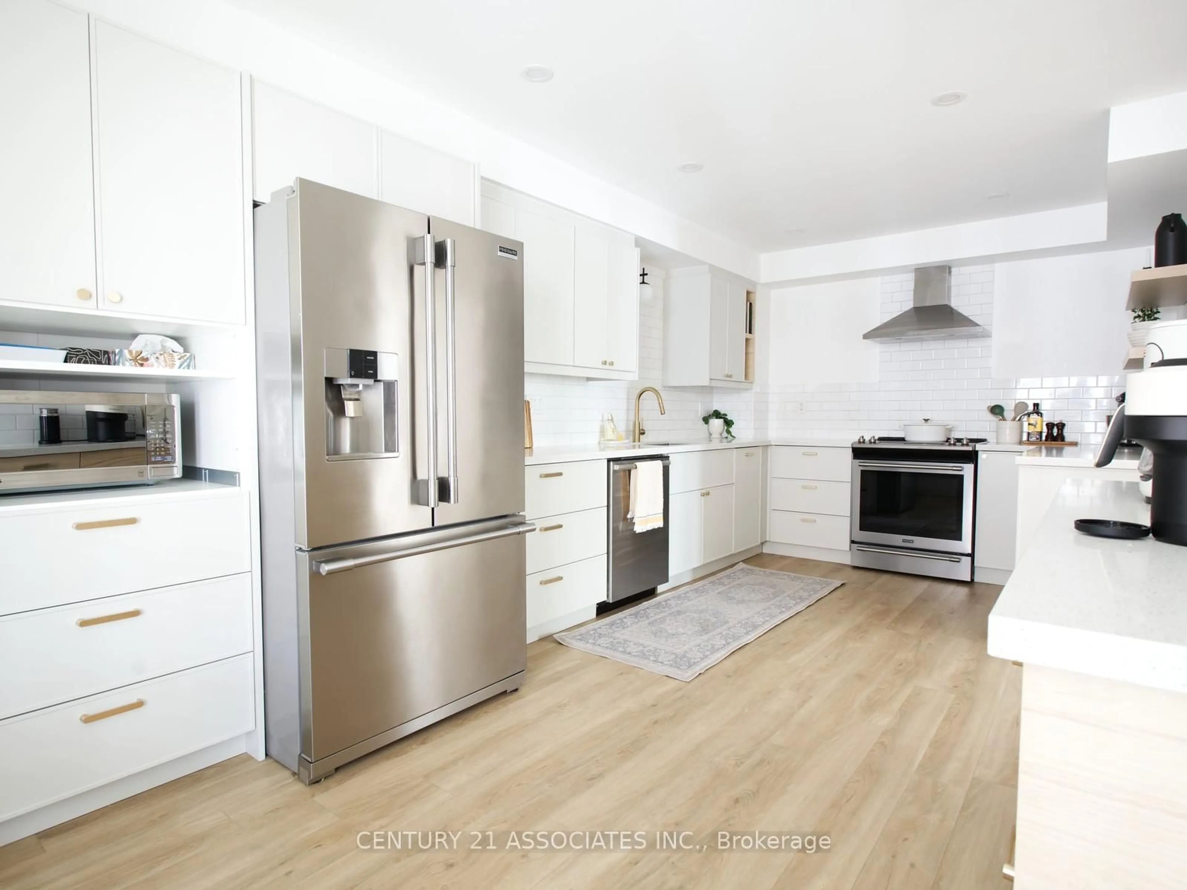 Open concept kitchen, wood/laminate floor for 77 THORNLODGE Dr, Hamilton Ontario L0R 3H3