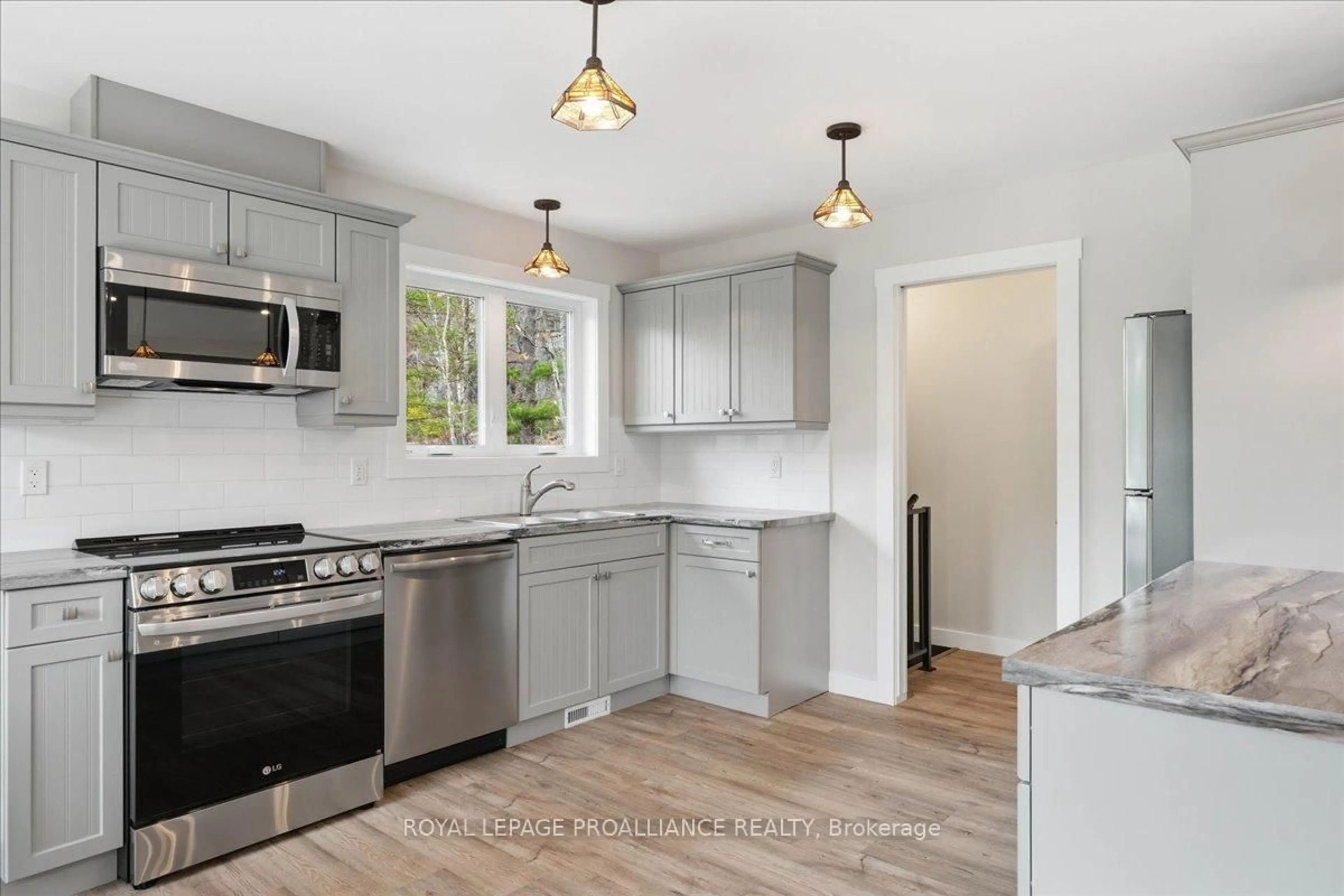 Open concept kitchen, ceramic/tile floor for 530 Addington Rd 5, Cloyne Ontario K0H 1K0