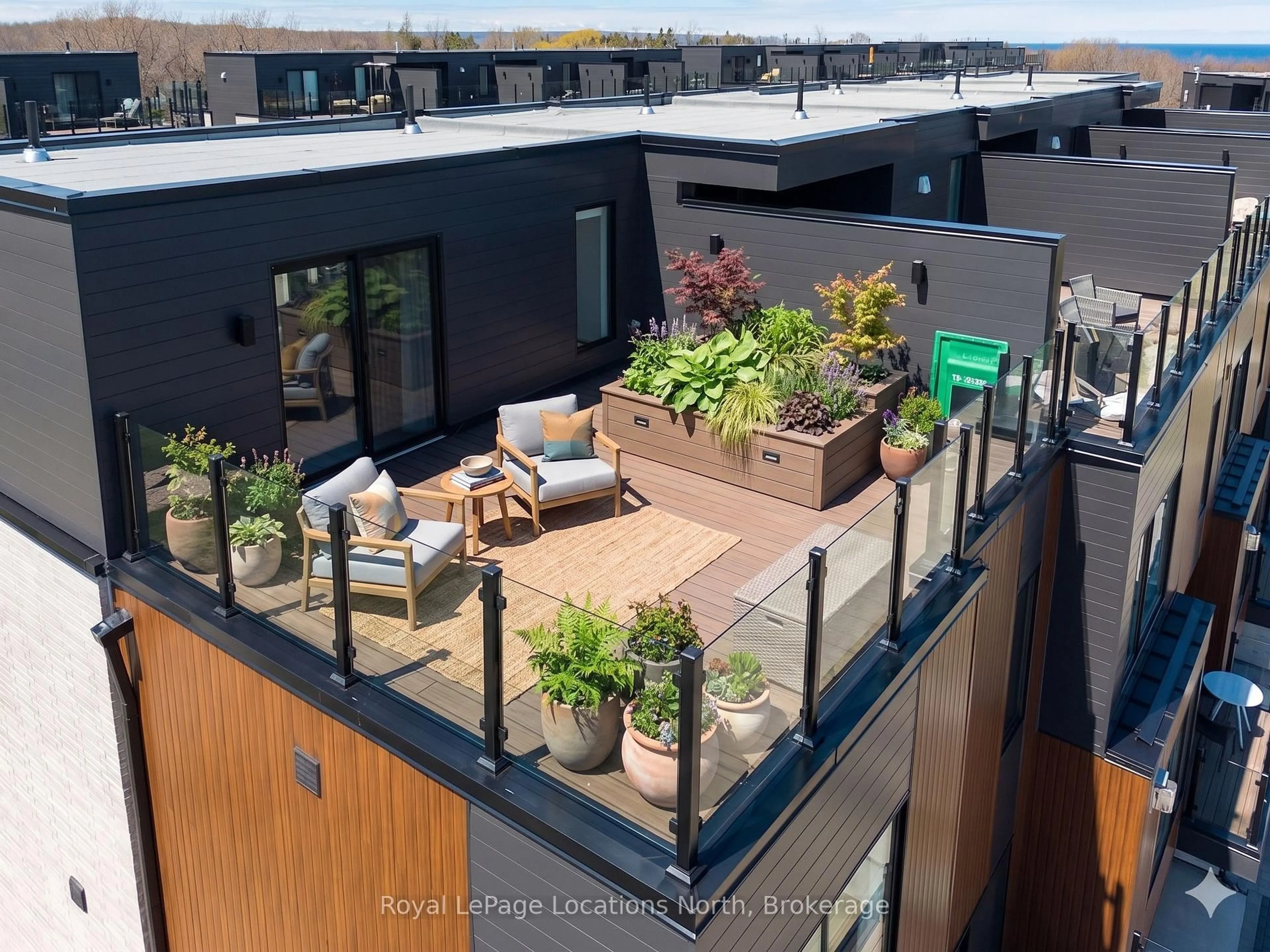 A pic from outside/outdoor area/front of a property/back of a property/a pic from drone, city buildings view from balcony for 117 Sladden Crt #5, Blue Mountains Ontario N0H 2P0