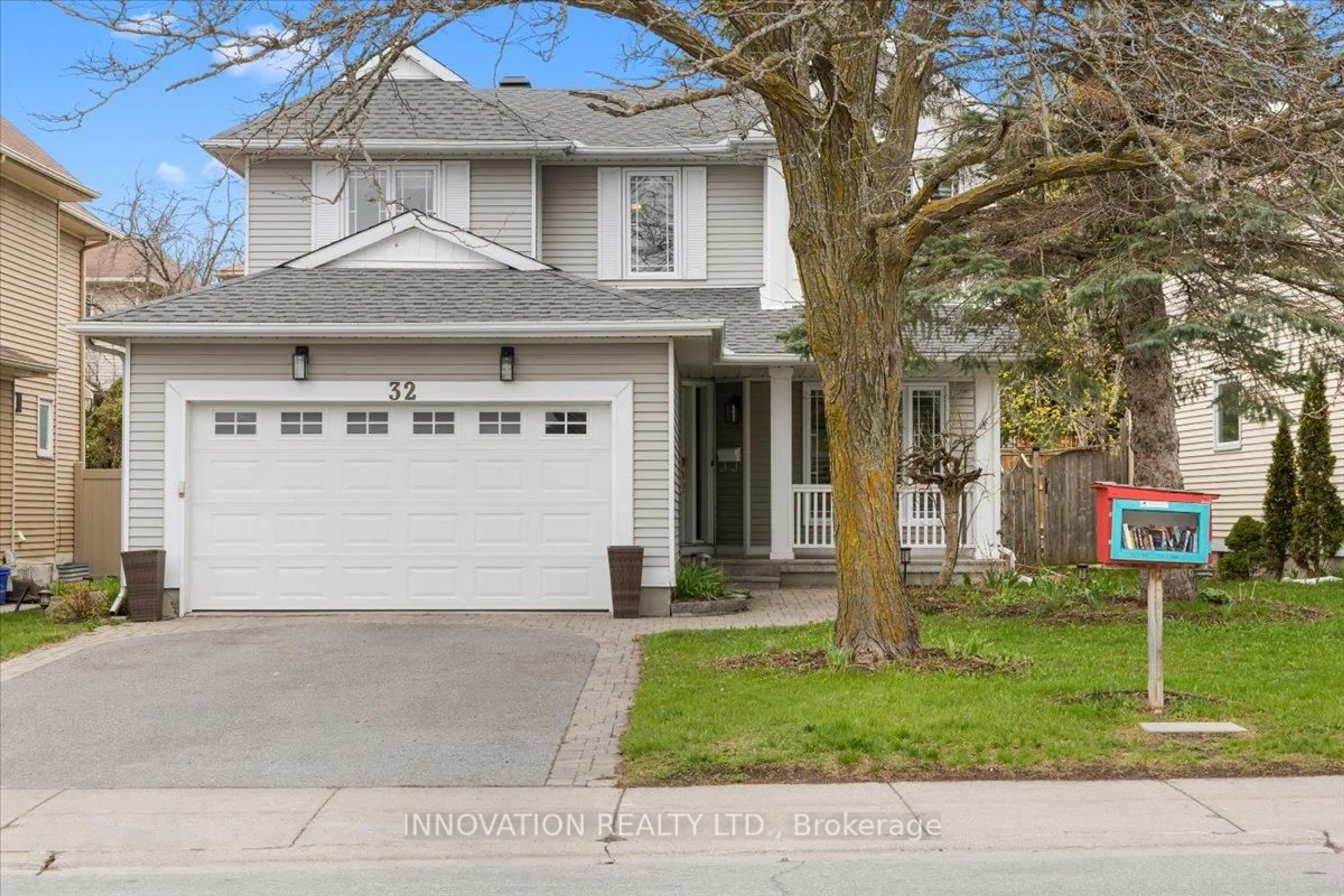 Home with vinyl exterior material, street for 32 Weybridge Dr, Ottawa Ontario K2J 2Z7