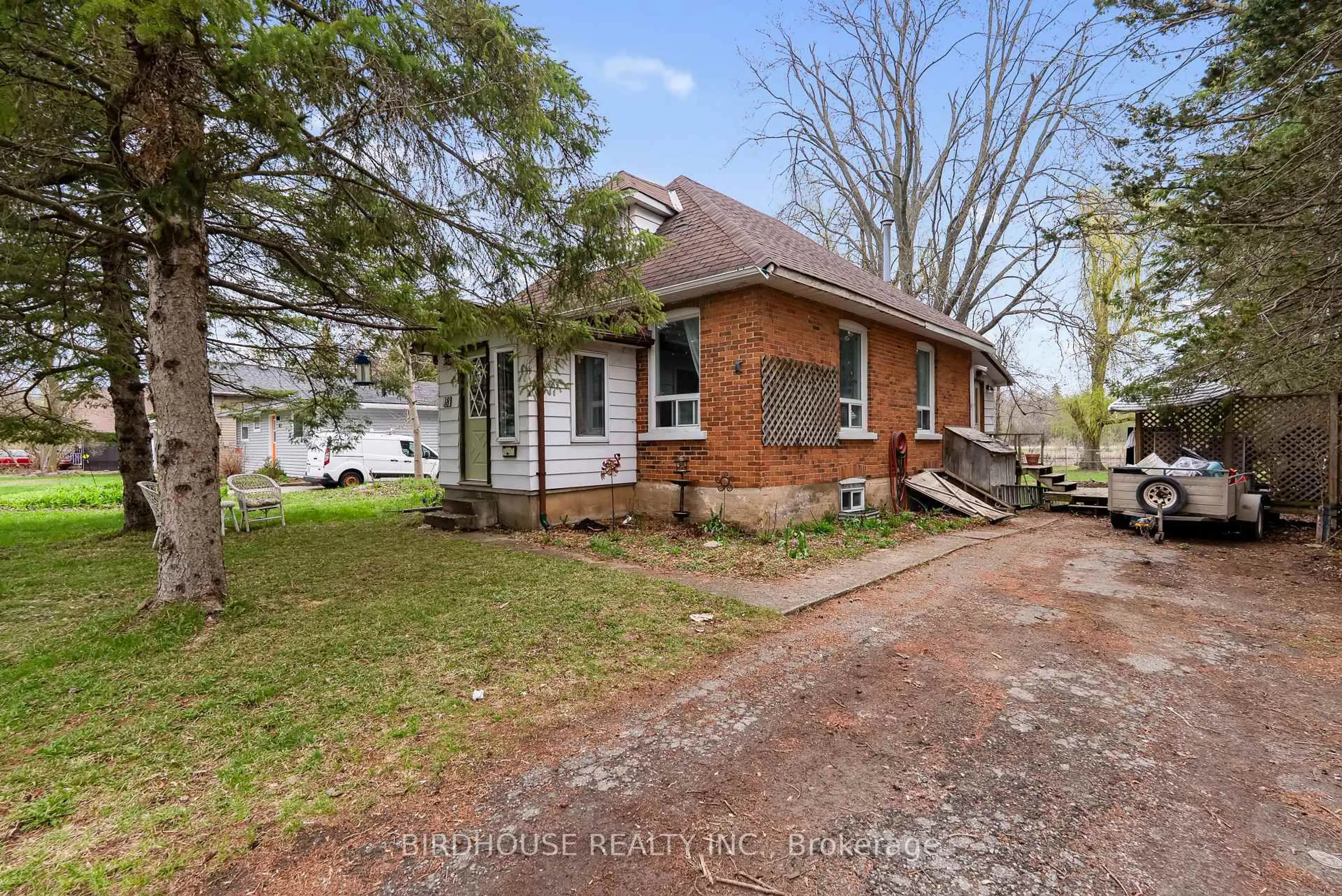 Home with brick exterior material, street for 18 Water St, Kawartha Lakes Ontario K9V 2C8
