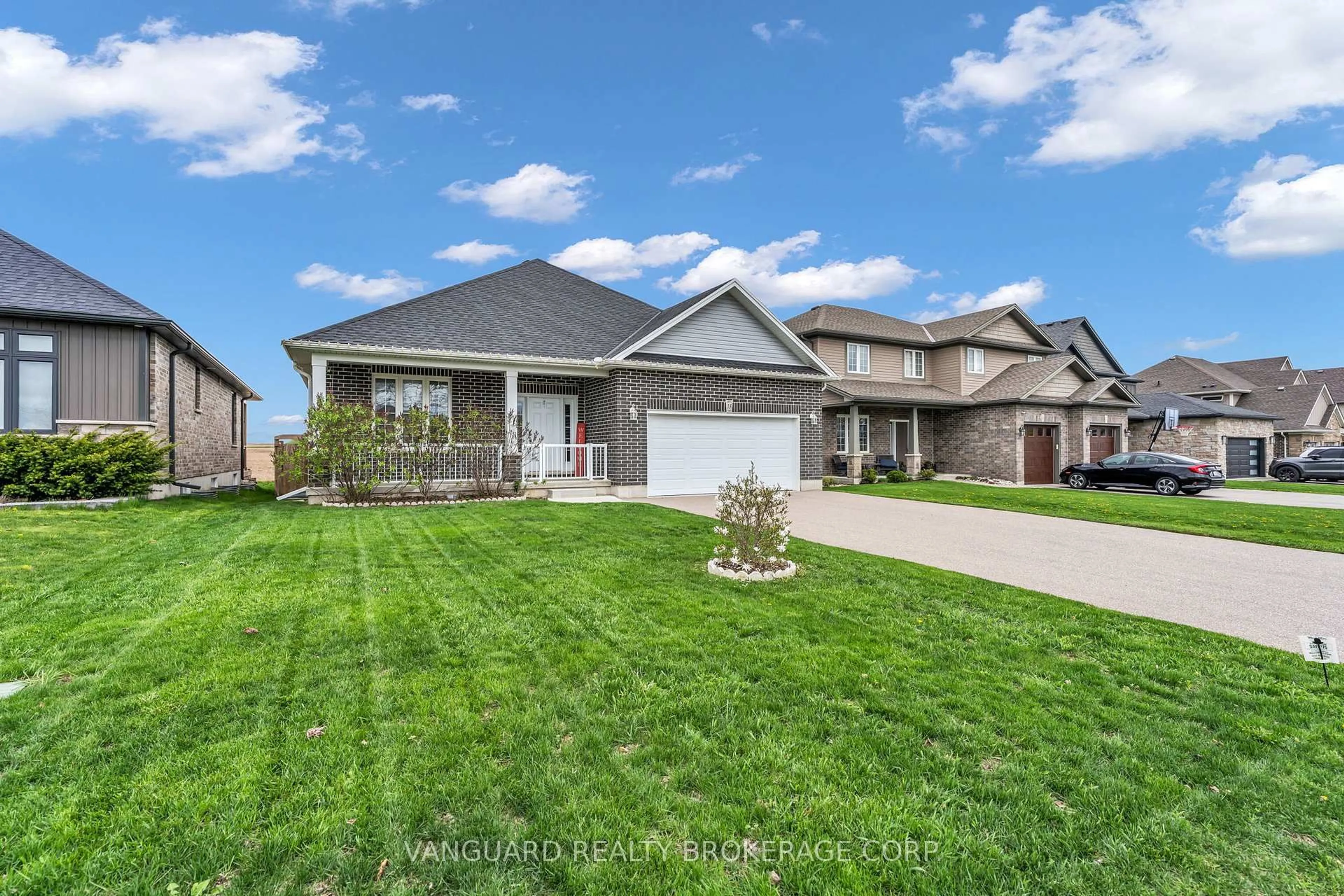 Home with vinyl exterior material, street for 18 Crocus Ave, Tillsonburg Ontario N4G 5S9