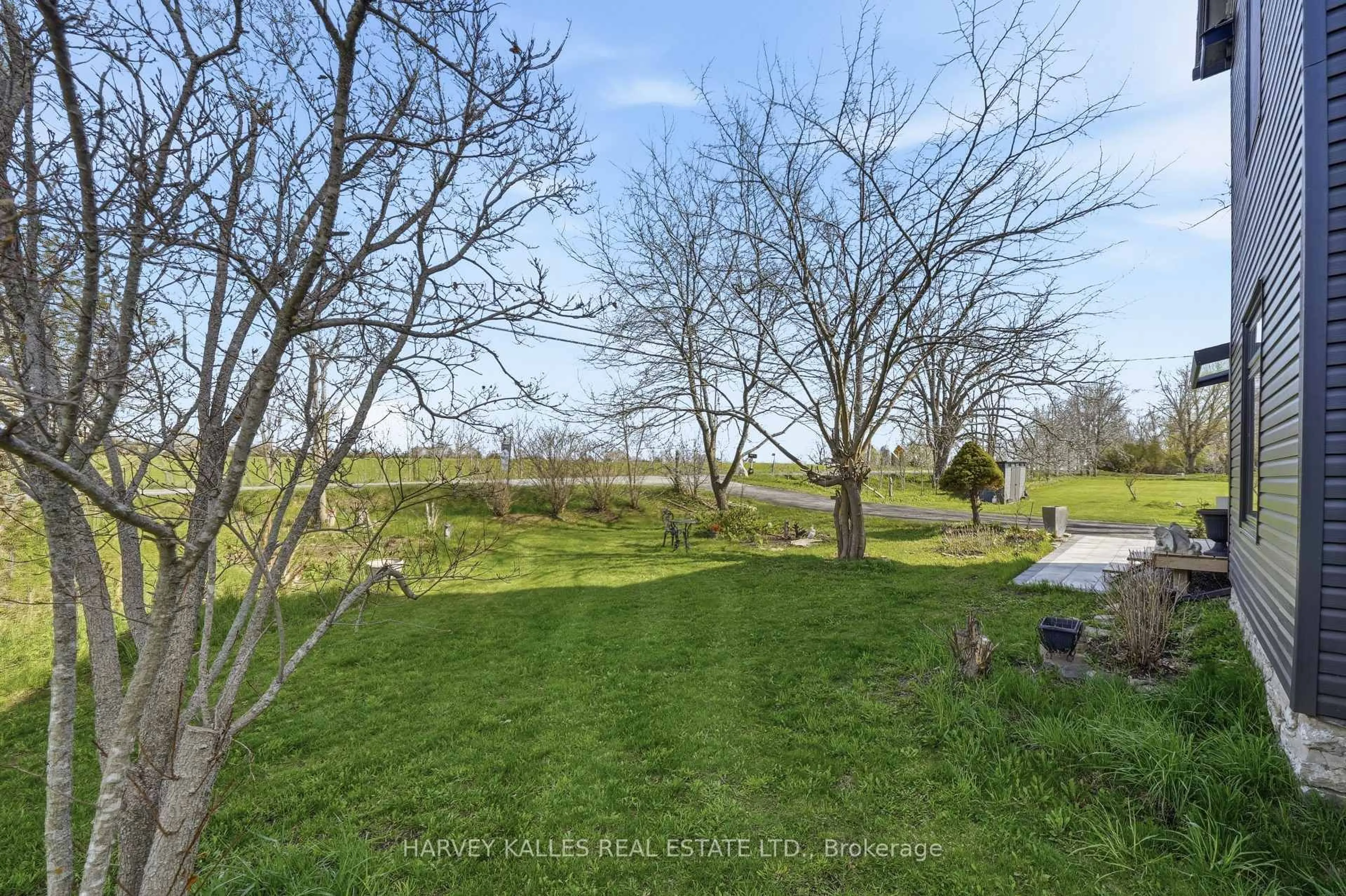 A pic from outside/outdoor area/front of a property/back of a property/a pic from drone, water/lake/river/ocean view for 506 County Rd 10 Rd, Prince Edward County Ontario K0K 2T0
