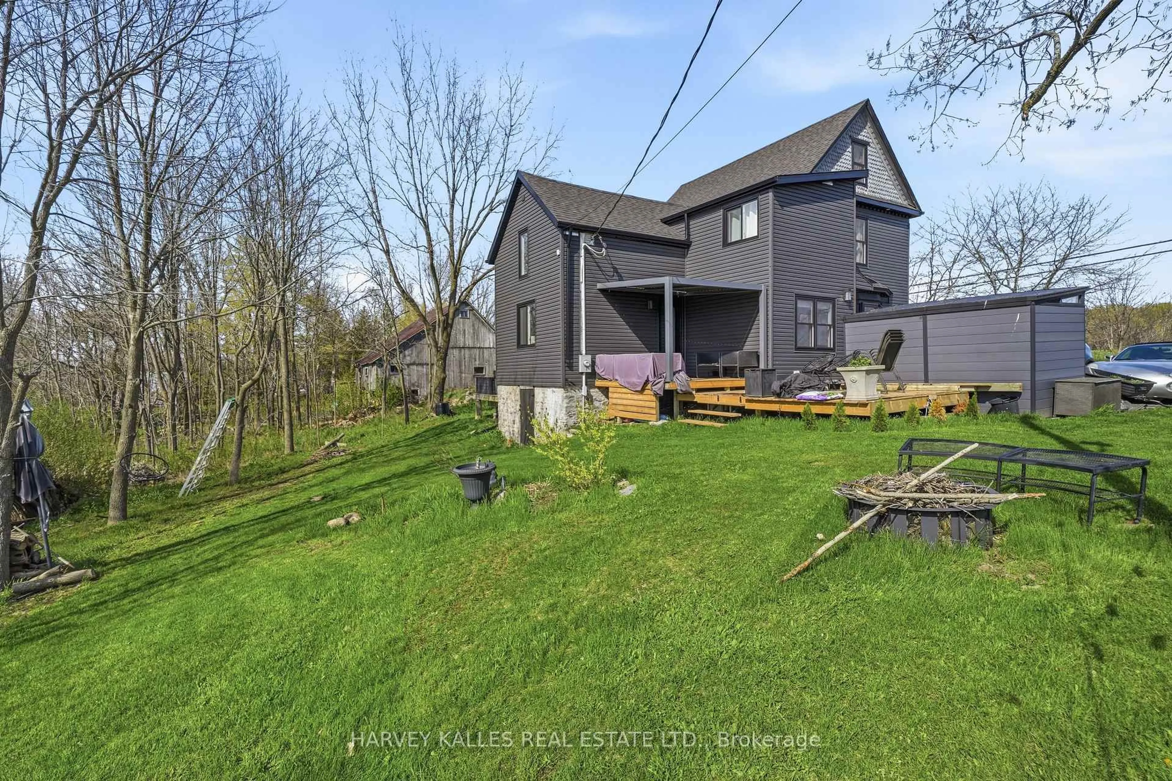 A pic from outside/outdoor area/front of a property/back of a property/a pic from drone, unknown for 506 County Rd 10 Rd, Prince Edward County Ontario K0K 2T0