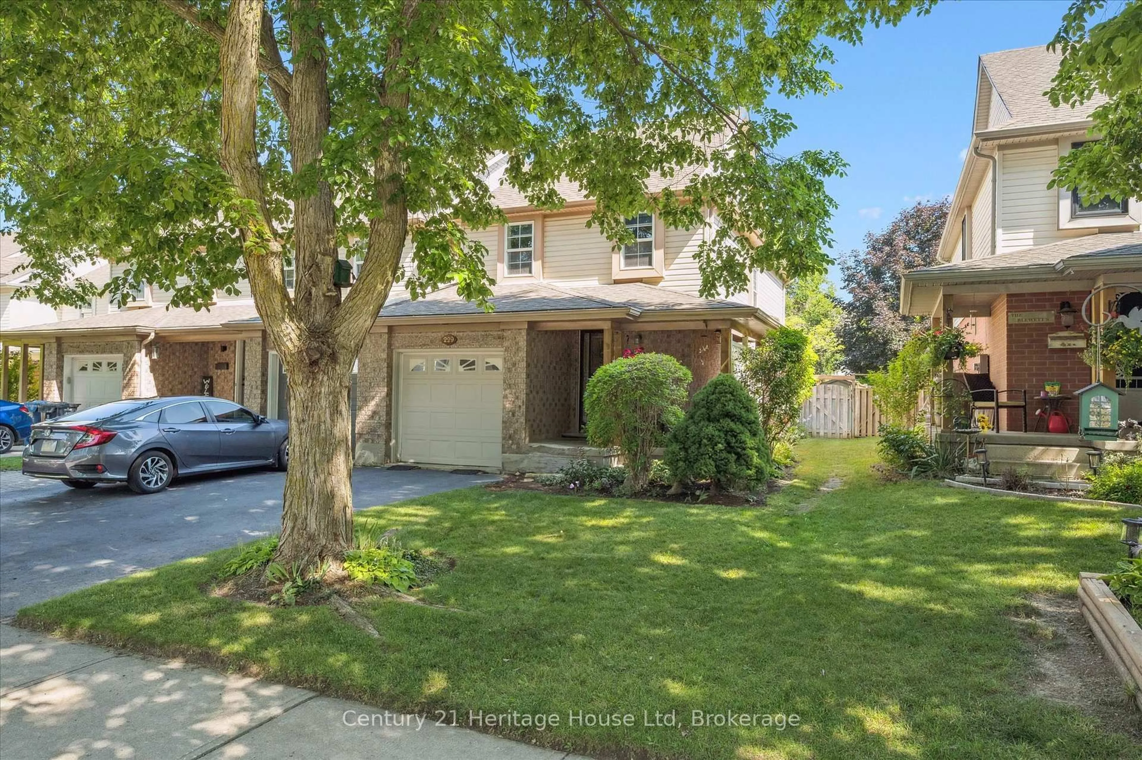 A pic from outside/outdoor area/front of a property/back of a property/a pic from drone, street for 229 Silurian Dr, Guelph Ontario N1E 7B8