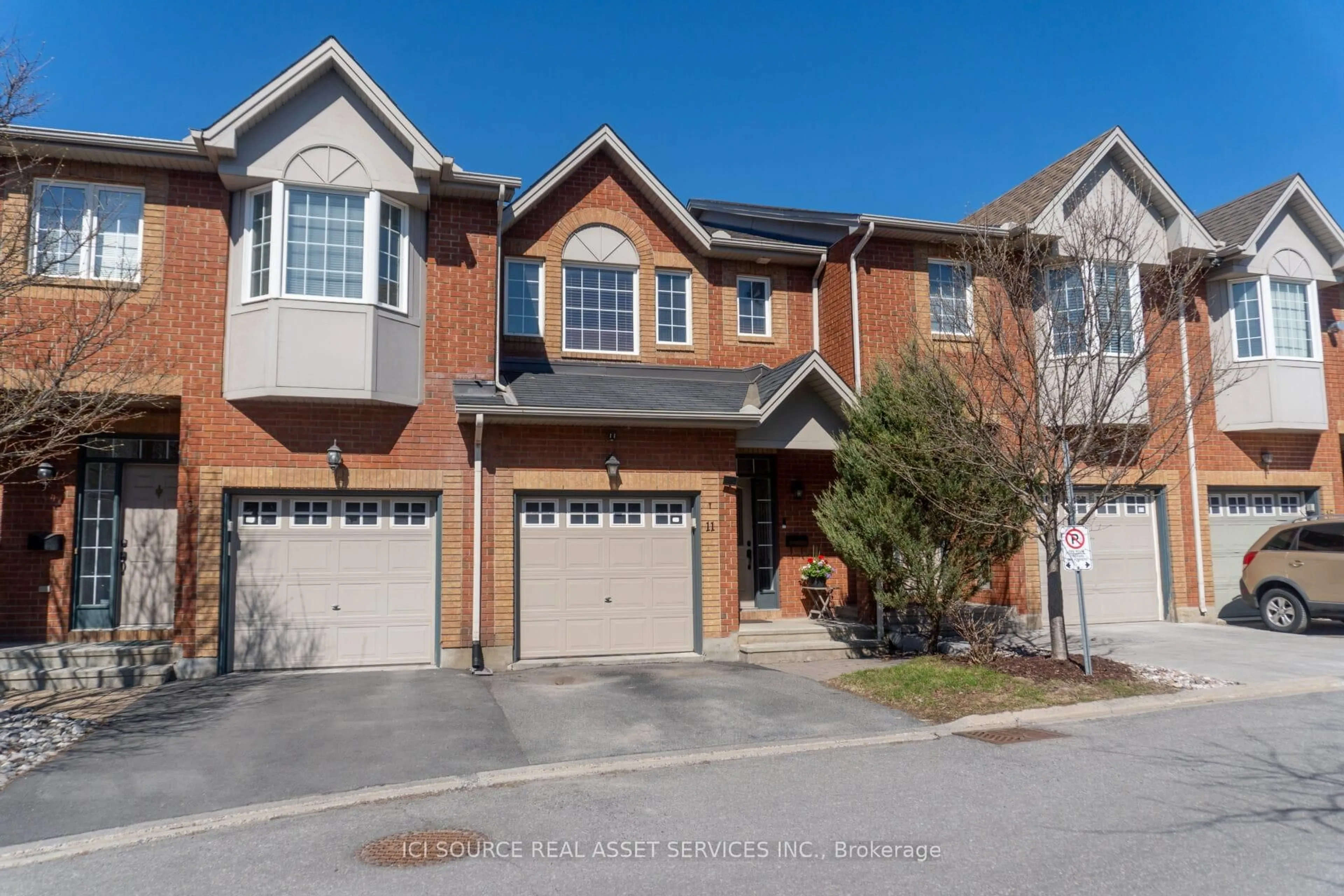 Home with brick exterior material, street for 11 Great Oak Private, Ottawa Ontario K1G 6P7