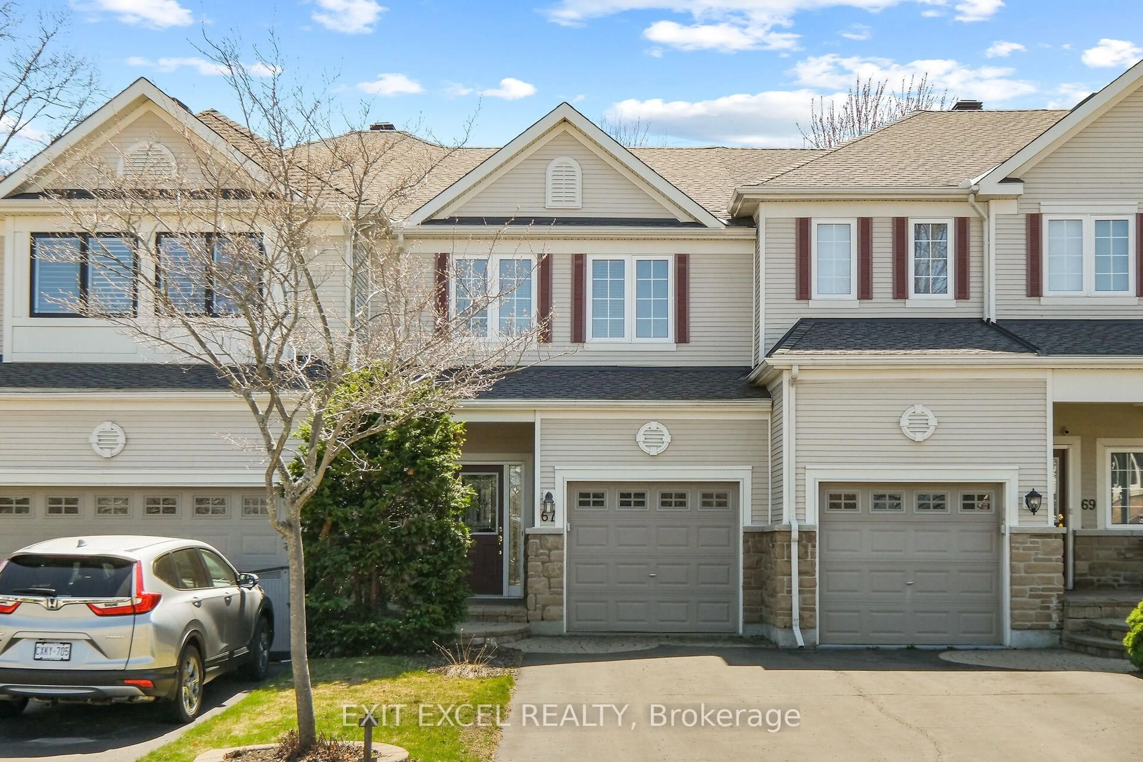 A pic from outside/outdoor area/front of a property/back of a property/a pic from drone, street for 67 Hawktree, Ottawa Ontario K2J 5N3