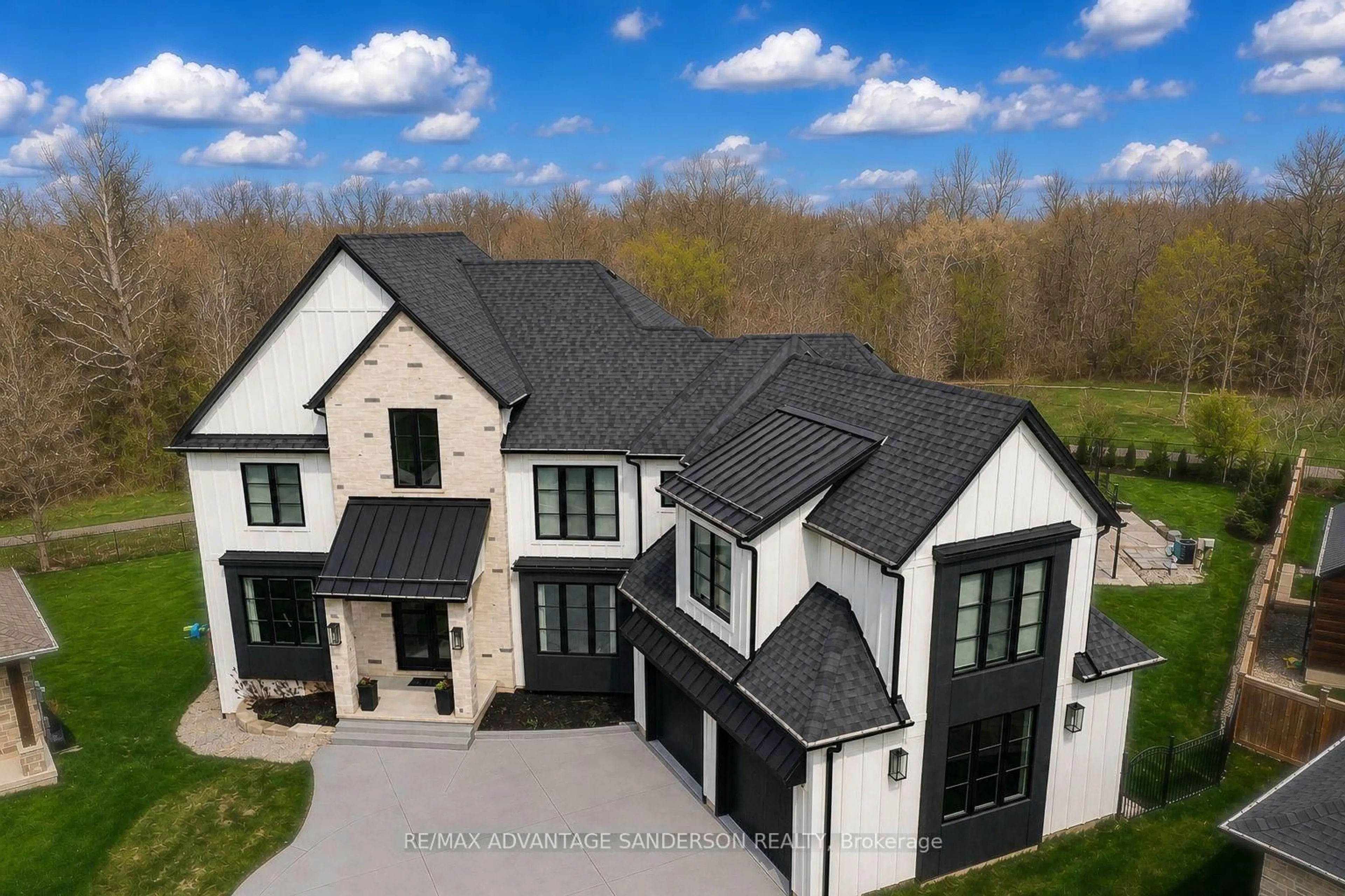 A pic from outside/outdoor area/front of a property/back of a property/a pic from drone, unknown for 1625 Warbler Woods Walk, London South Ontario N6K 0H9