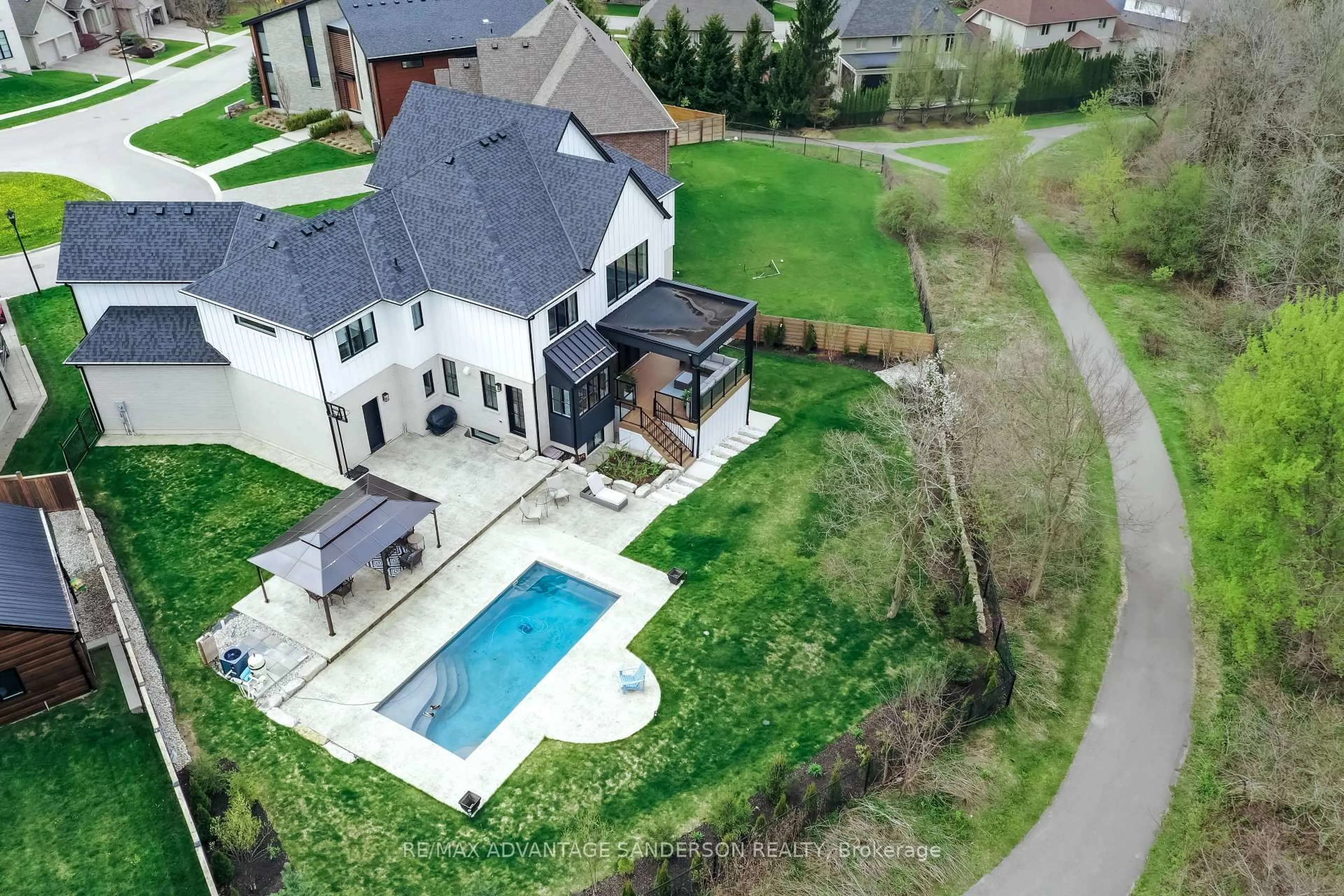 A pic from outside/outdoor area/front of a property/back of a property/a pic from drone, unknown for 1625 Warbler Woods Walk, London South Ontario N6K 0H9