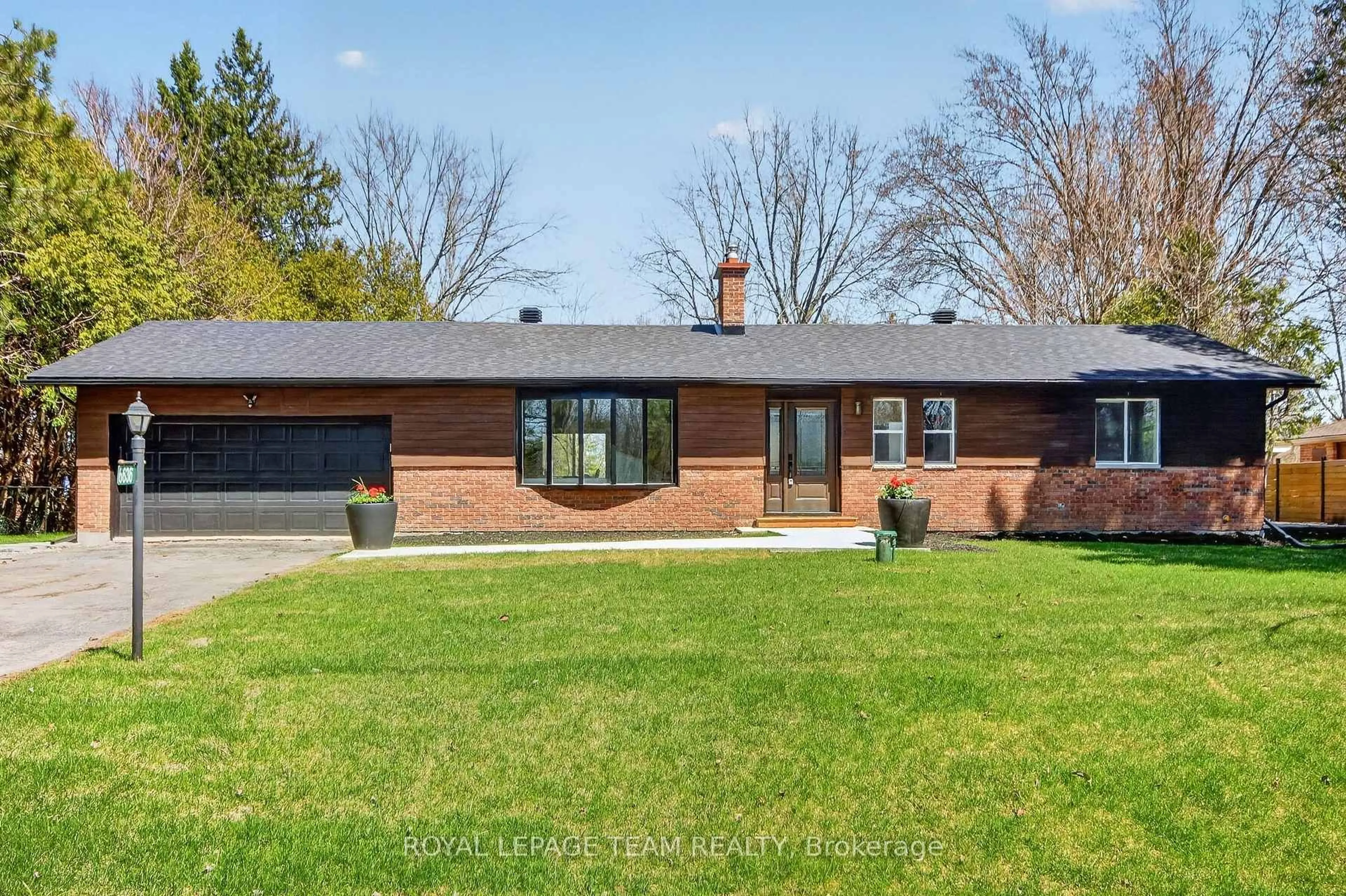 Home with brick exterior material, street for 6636 MARINA Dr, Manotick Ontario K4M 1B3