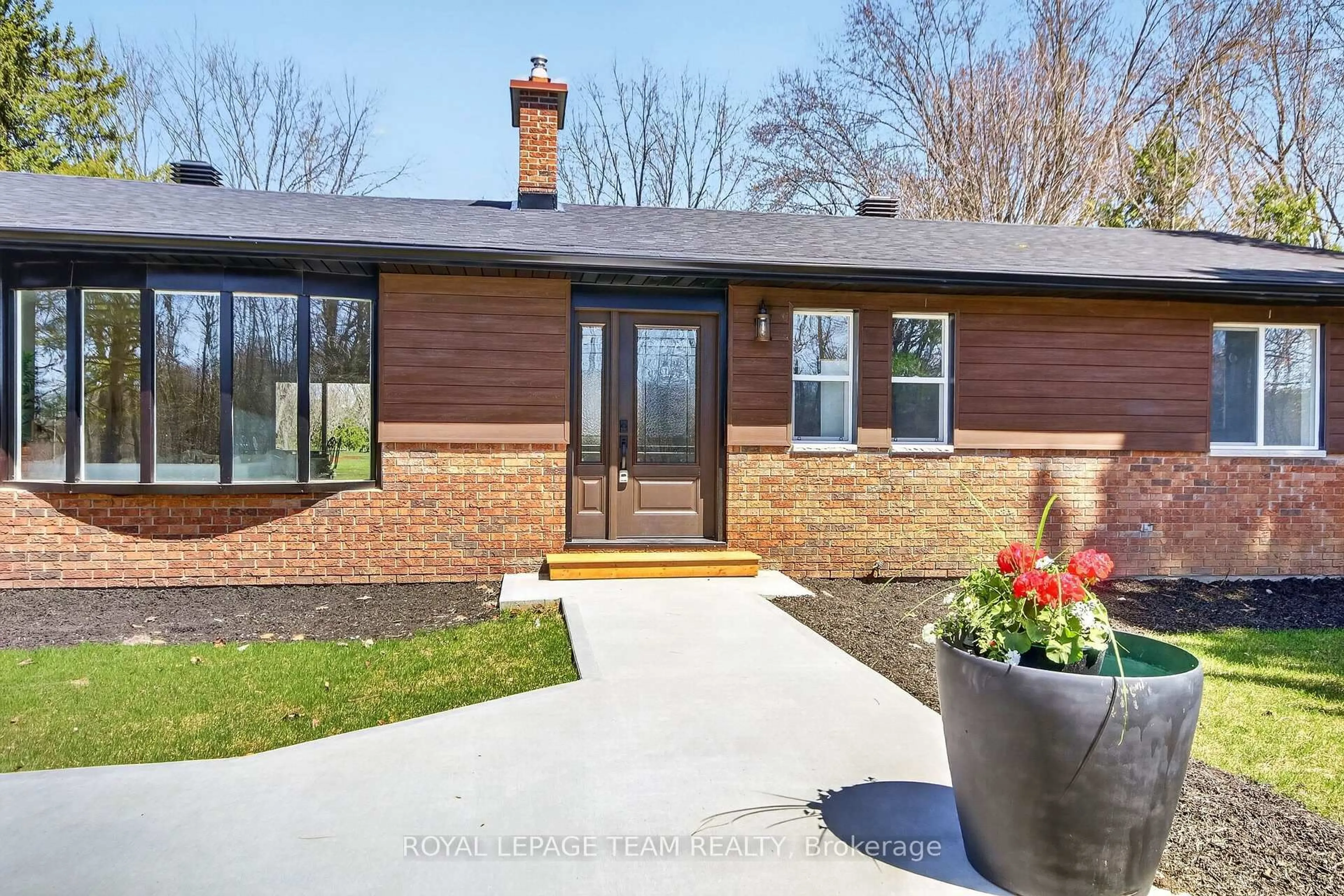 Home with brick exterior material, street for 6636 MARINA Dr, Manotick Ontario K4M 1B3