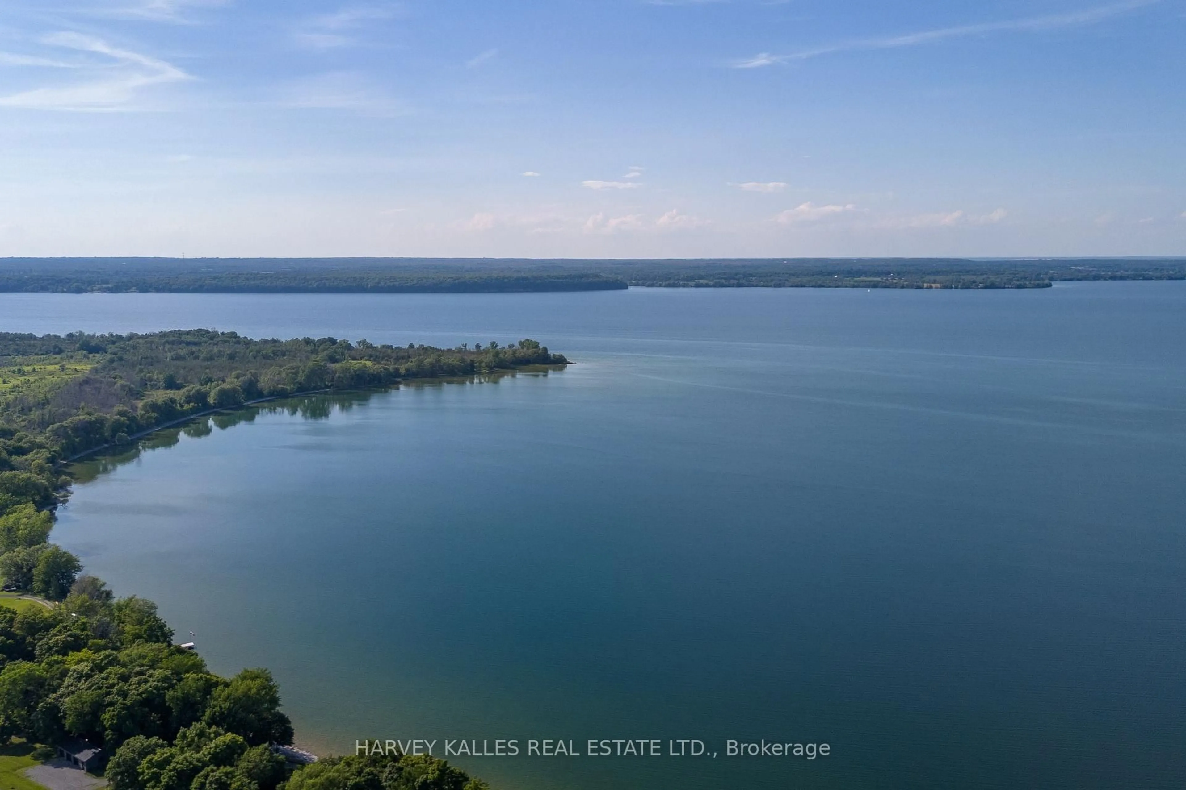A pic from outside/outdoor area/front of a property/back of a property/a pic from drone, water/lake/river/ocean view for 3470 County Rd 13 Rd, Prince Edward County Ontario K0K 2T0