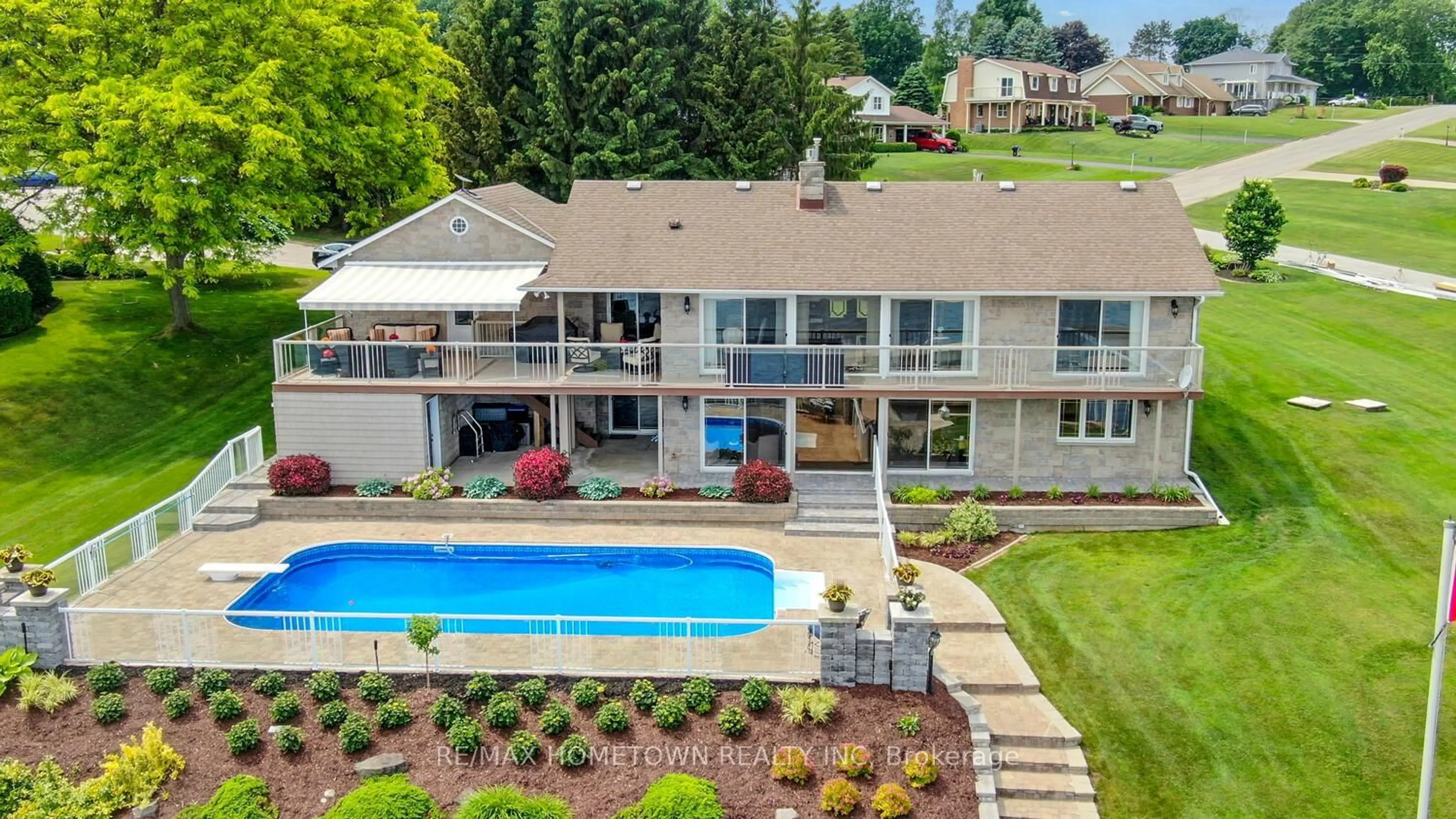 A pic from outside/outdoor area/front of a property/back of a property/a pic from drone, water/lake/river/ocean view for 1111 Burnside Dr, Augusta Ontario K6V 5T1