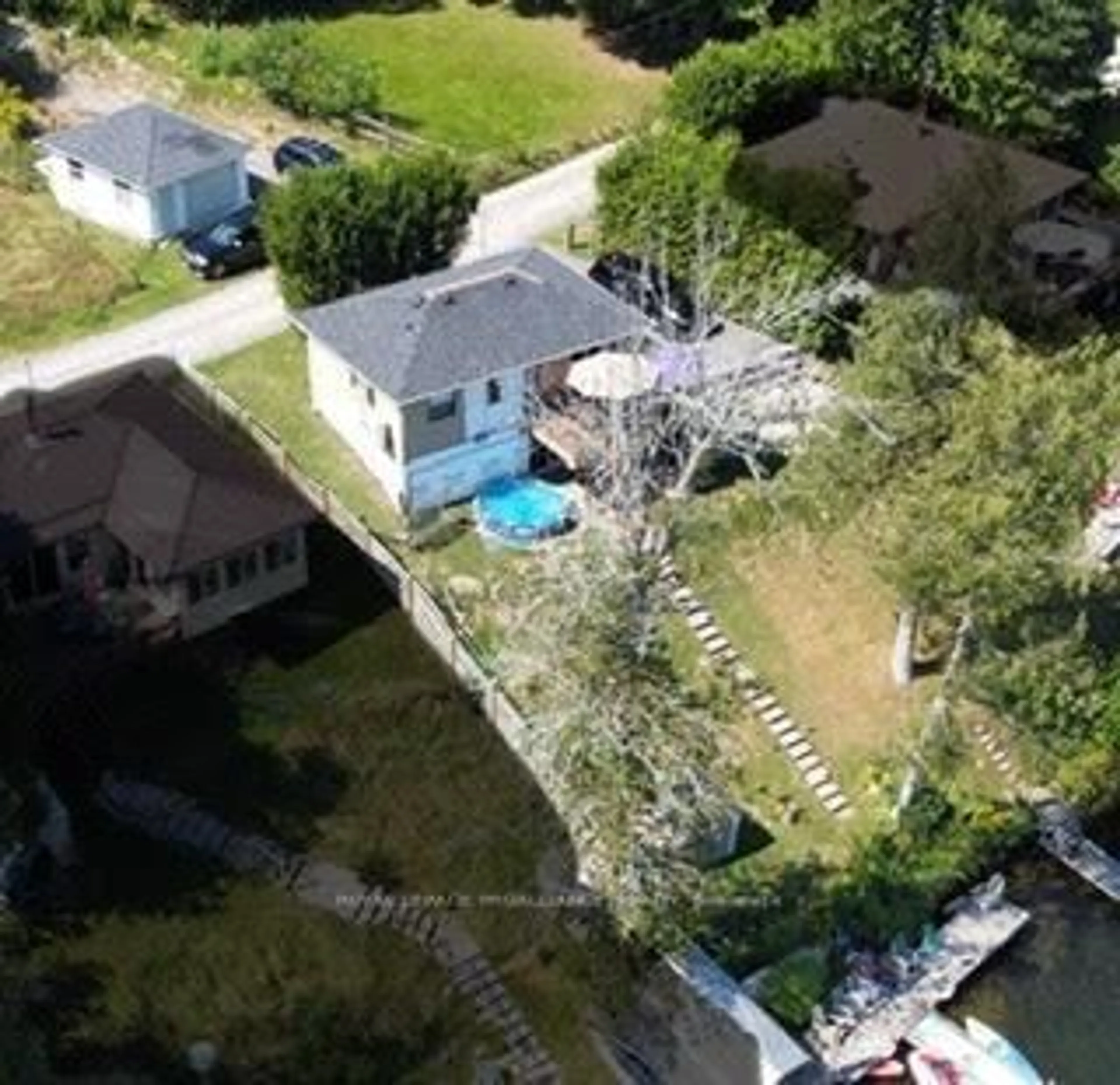A pic from outside/outdoor area/front of a property/back of a property/a pic from drone, water/lake/river/ocean view for 337/338 Rainbow Dr, Otonabee-South Monaghan Ontario K0L 1B0