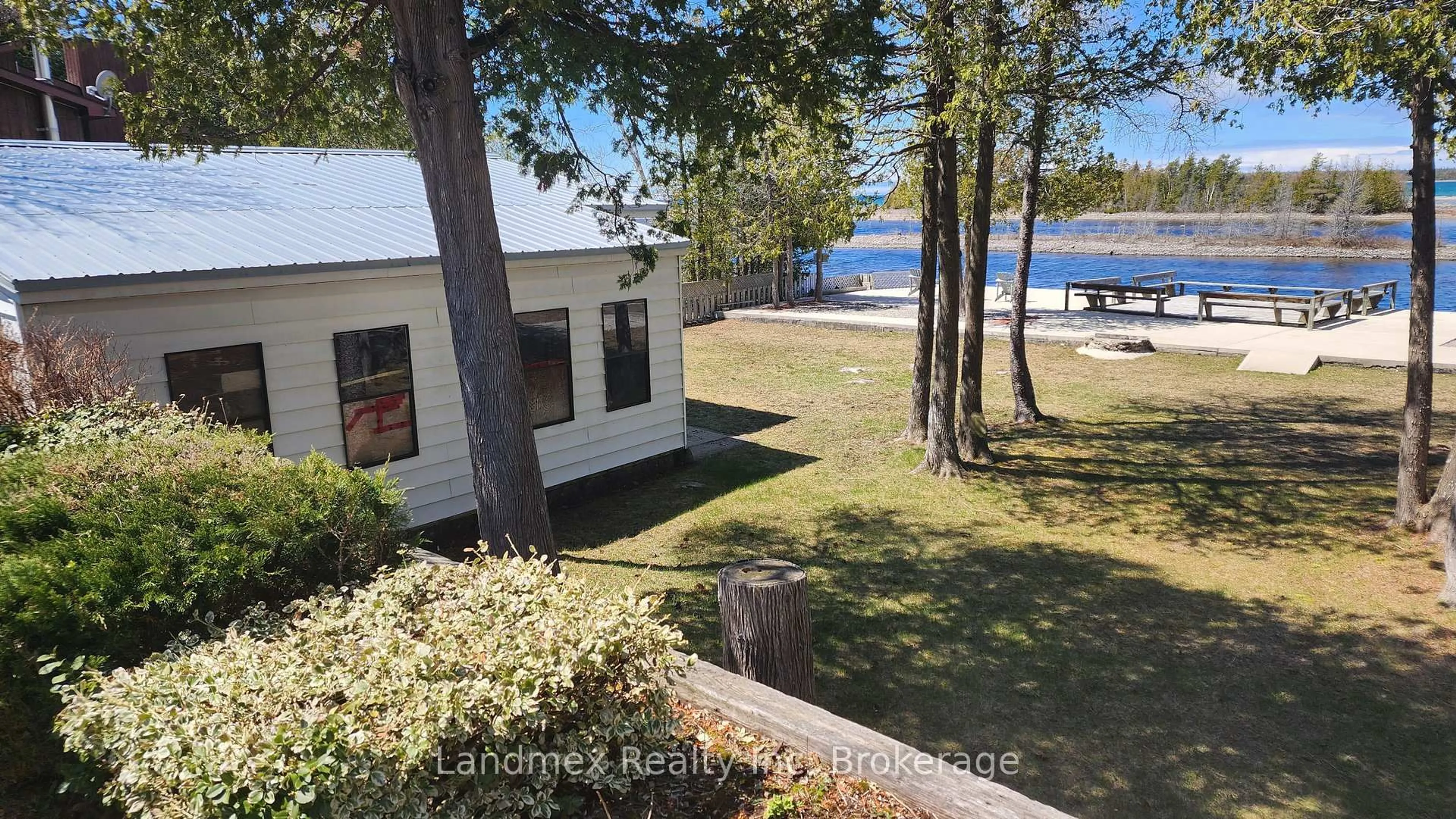 A pic from outside/outdoor area/front of a property/back of a property/a pic from drone, water/lake/river/ocean view for 268 Dorcas Bay Rd, Northern Bruce Peninsula Ontario N0H 2R0