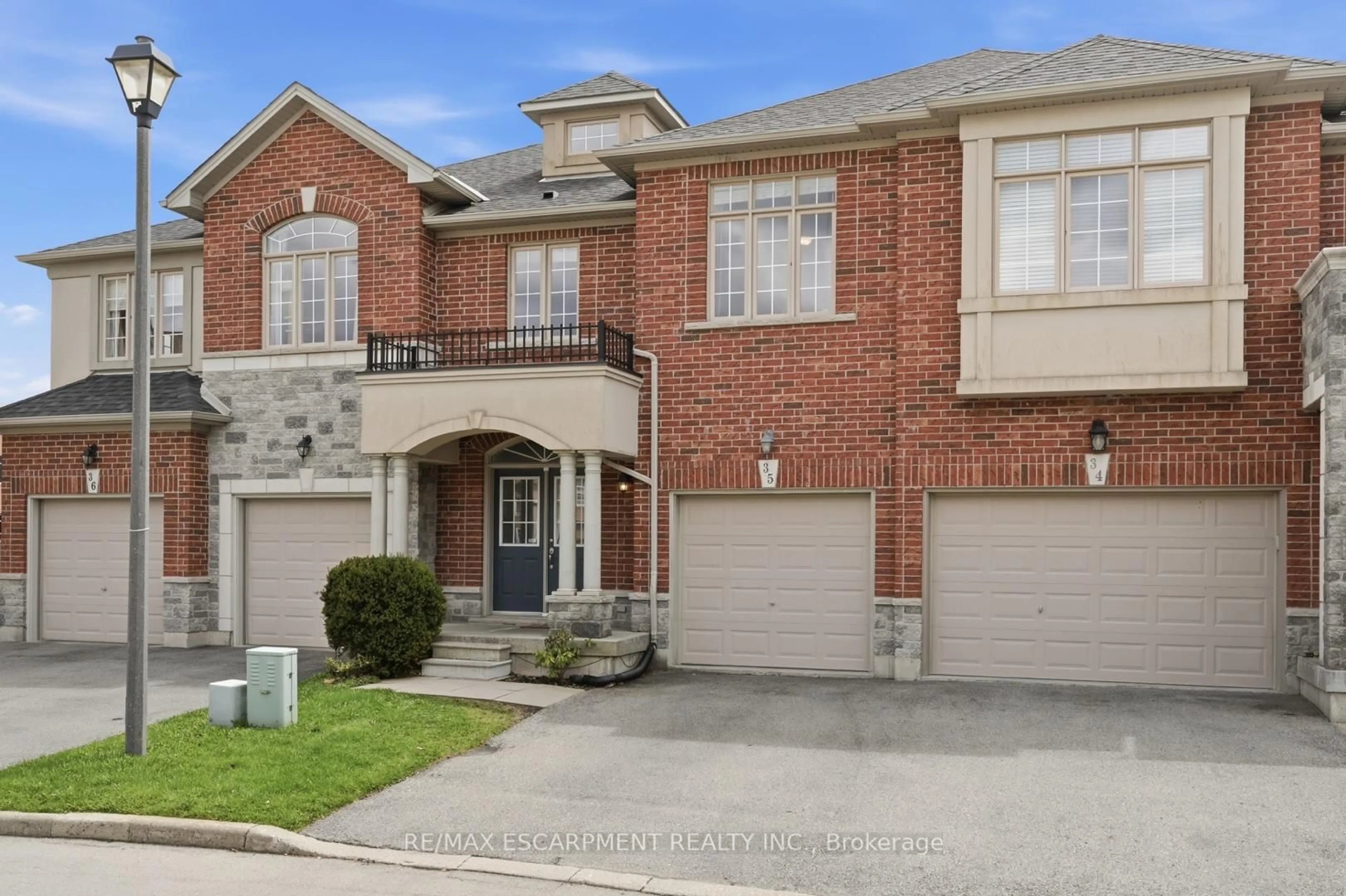 Home with brick exterior material, street for 99 PANABAKER Dr #35, Hamilton Ontario L9G 0A3