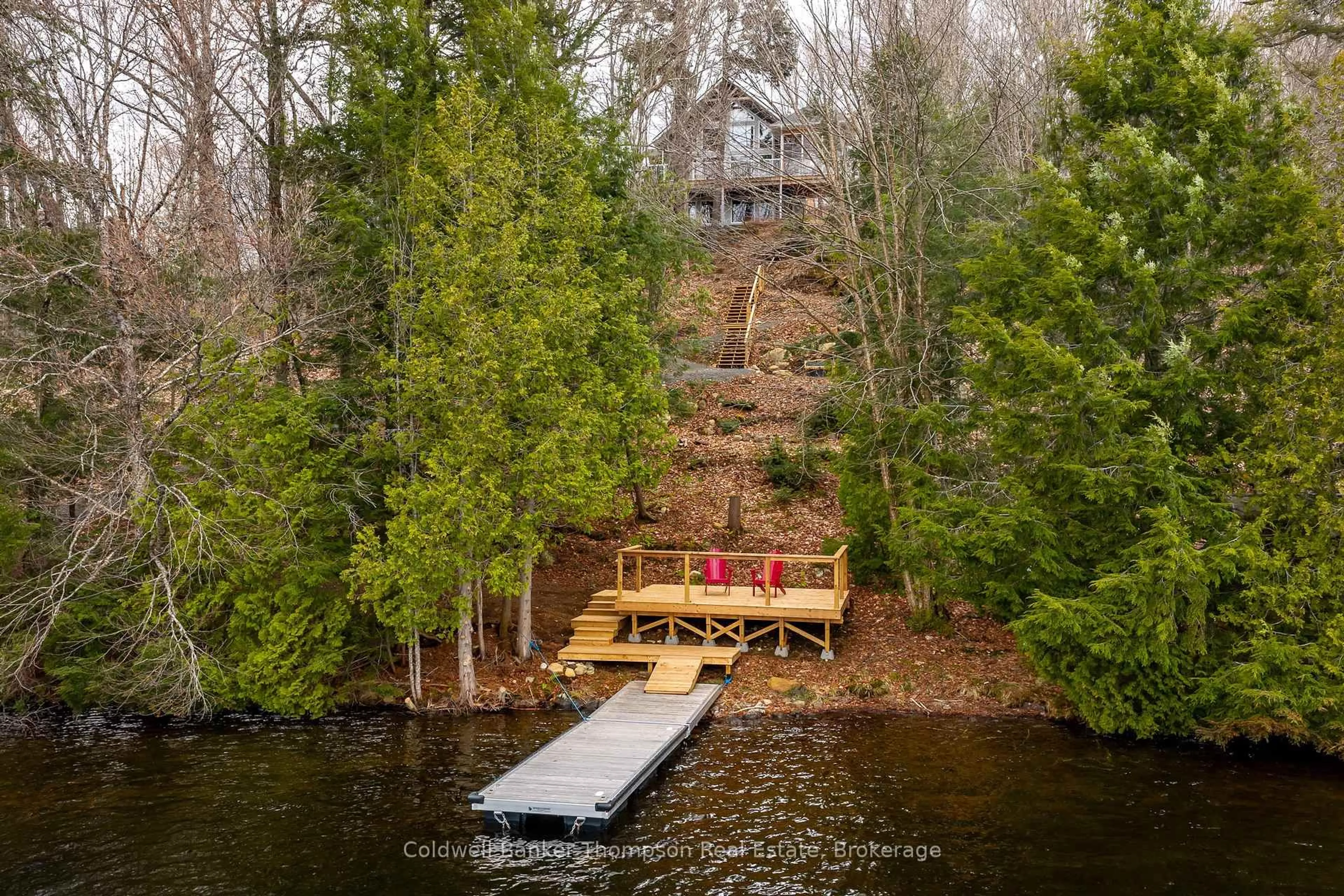 A pic from outside/outdoor area/front of a property/back of a property/a pic from drone, water/lake/river/ocean view for 63 Maple Dr, Perry Ontario P0A 1J0