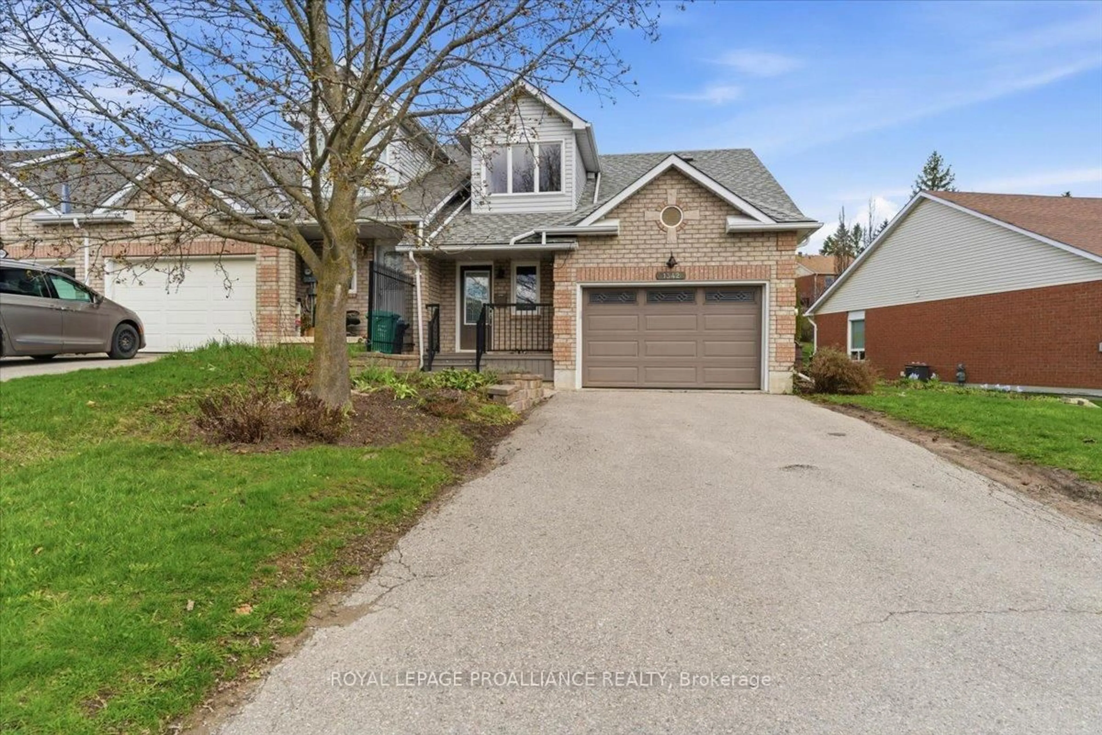 Home with brick exterior material, street for 1342 Eagle Cres, Peterborough Ontario K9K 2K7