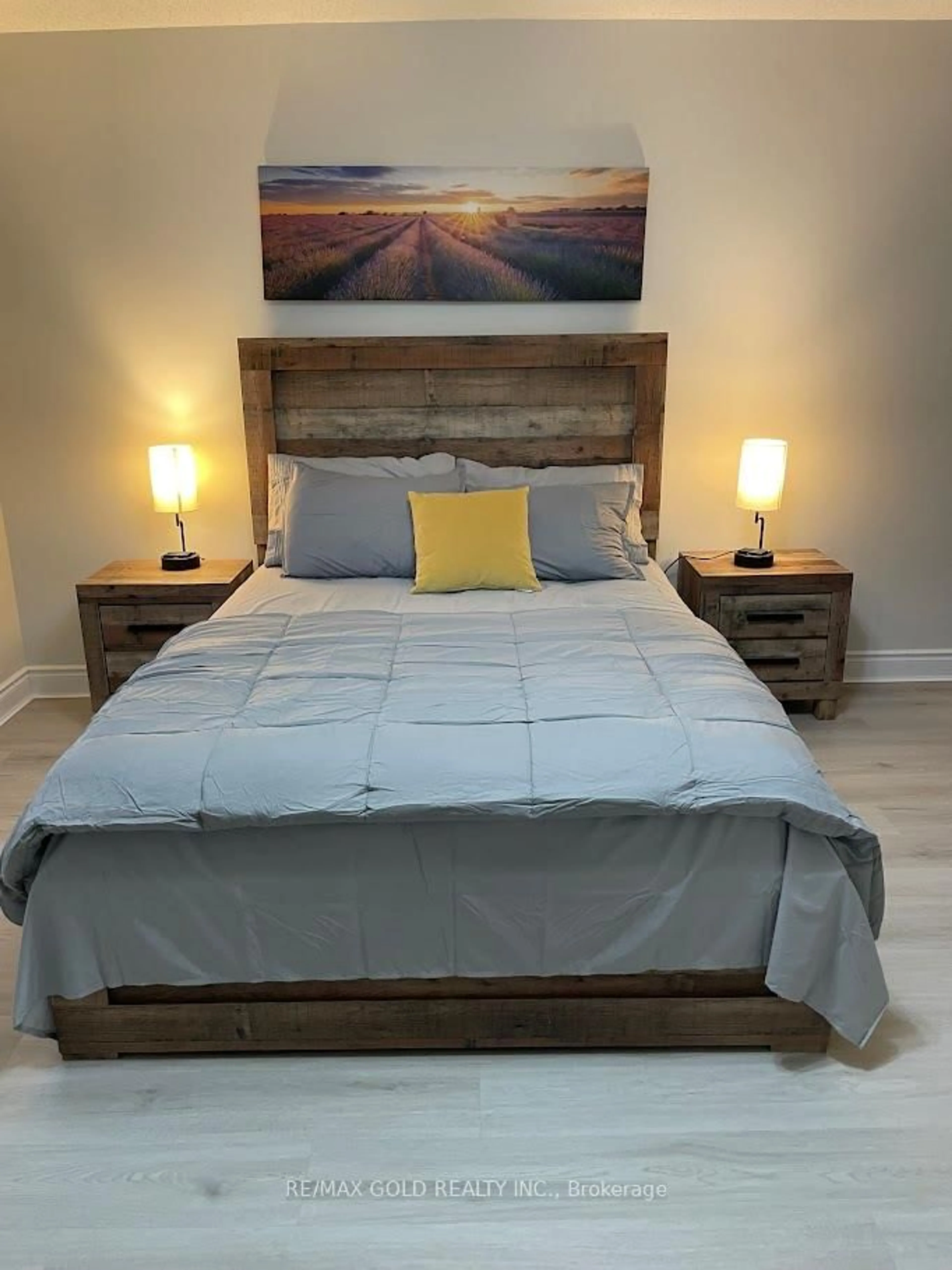 Bedroom with bed, wood/laminate floor for 53 Duncan Ave, Hamilton Ontario L0R 2H5