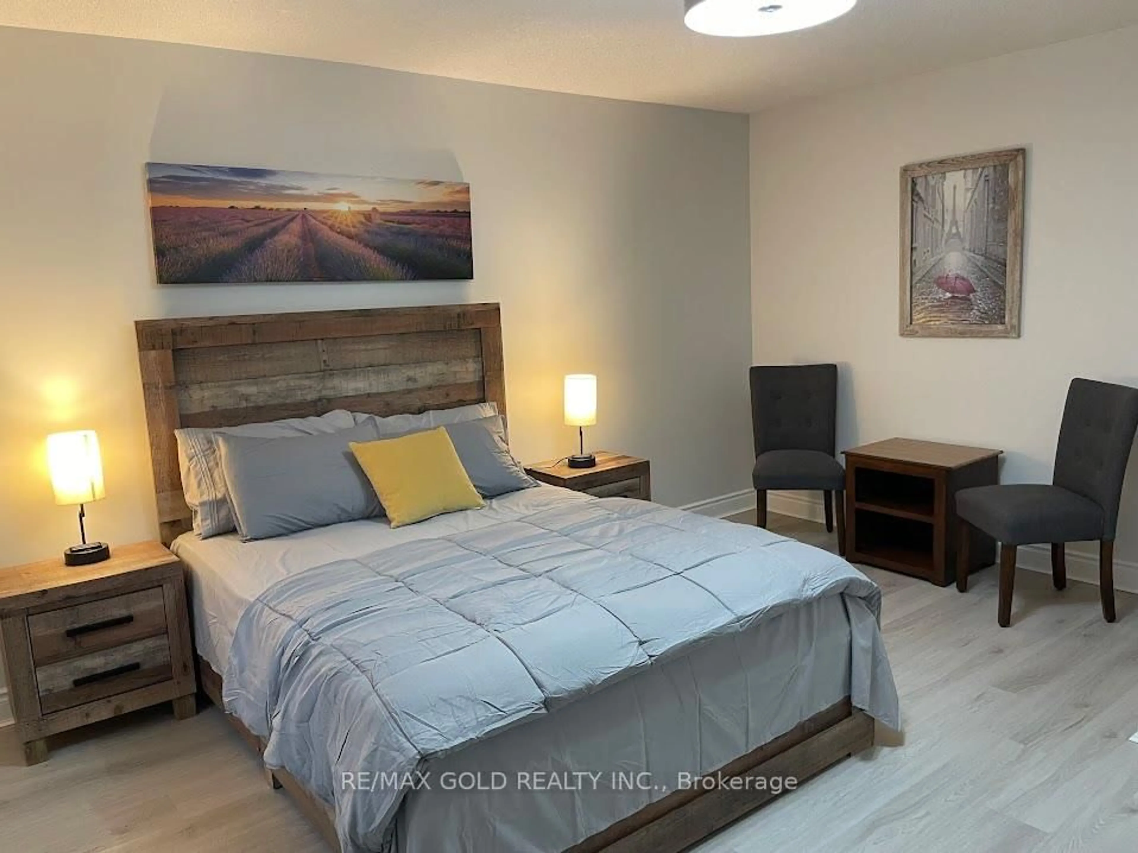 Bedroom with bed, wood/laminate floor for 53 Duncan Ave, Hamilton Ontario L0R 2H5