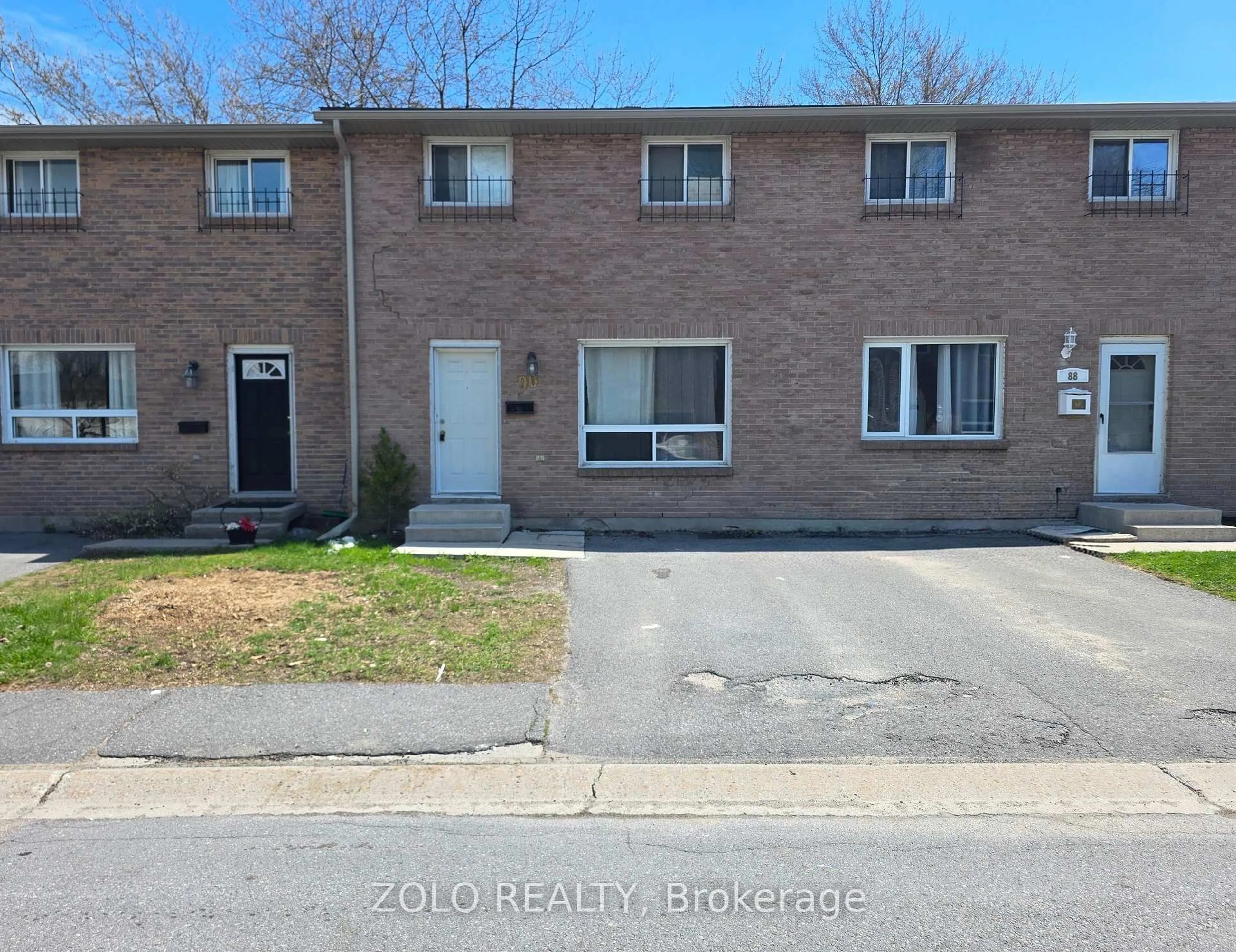 A pic from outside/outdoor area/front of a property/back of a property/a pic from drone, street for 90 Rosemund Cres #35, Kingston Ontario K7M 6Z4