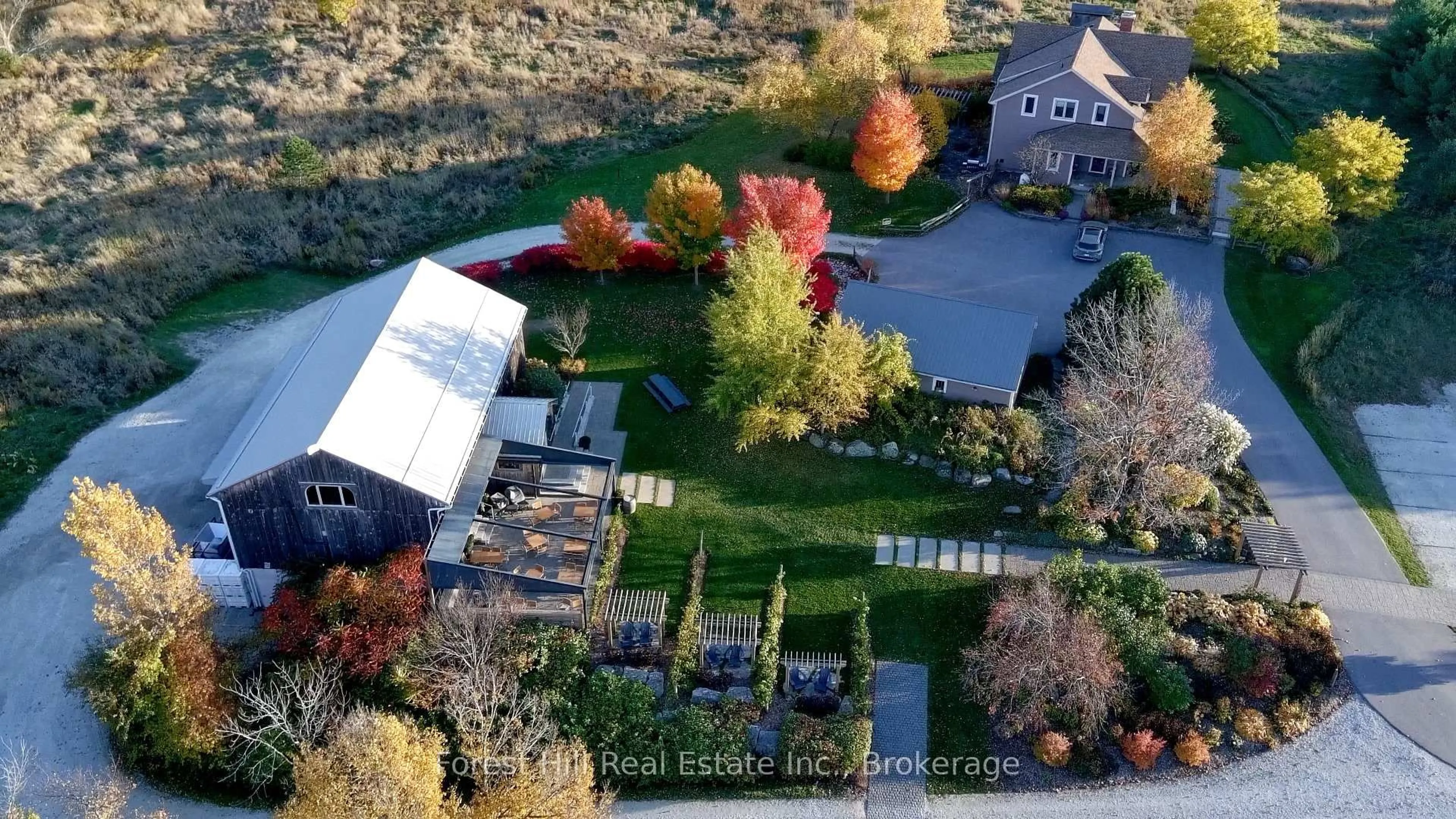 A pic from outside/outdoor area/front of a property/back of a property/a pic from drone, mountain view for 415763 10th Line, Blue Mountains Ontario N0H 1J0