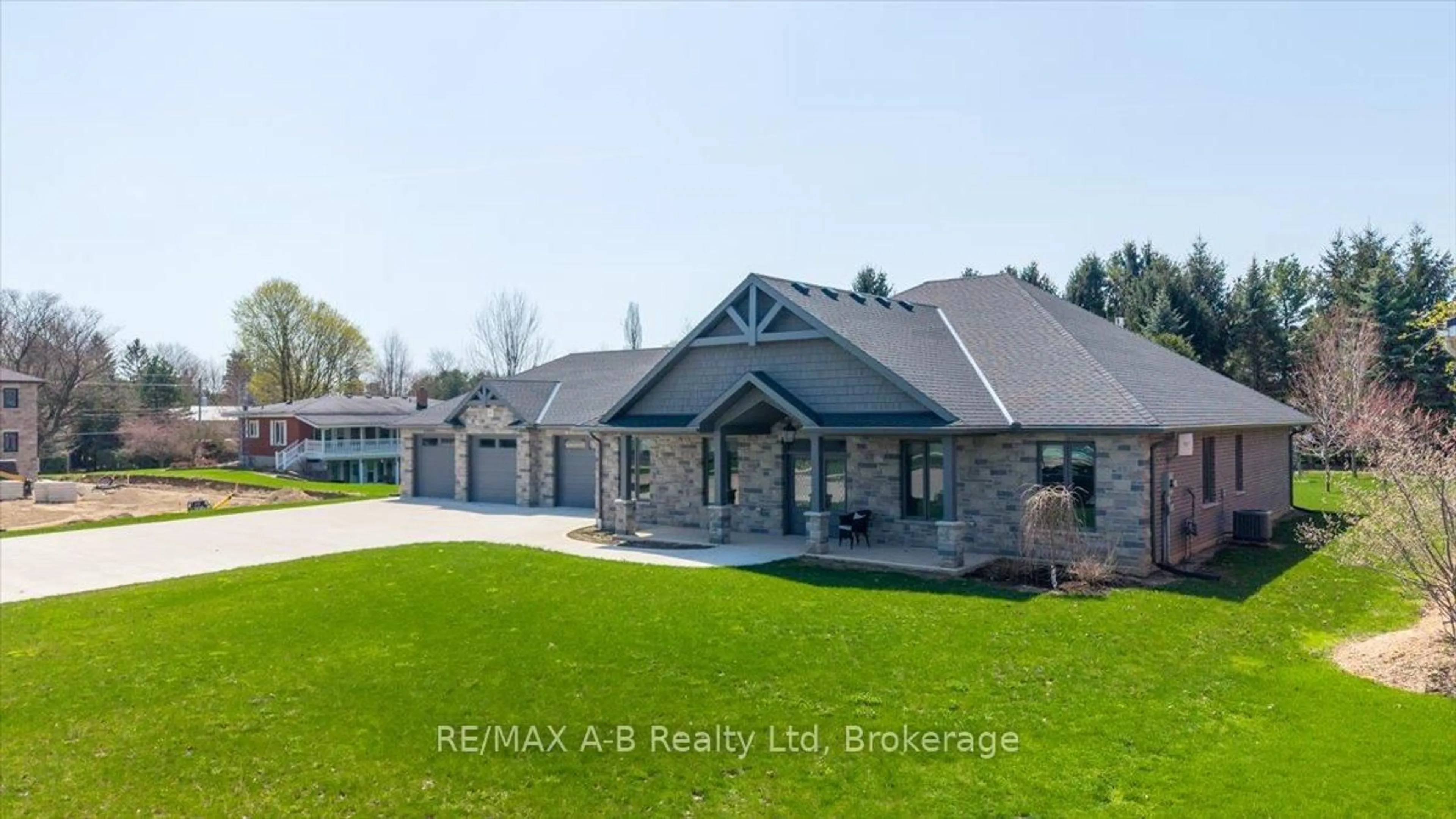 A pic from outside/outdoor area/front of a property/back of a property/a pic from drone, building for 54 William St, West Perth Ontario N0K 1N0