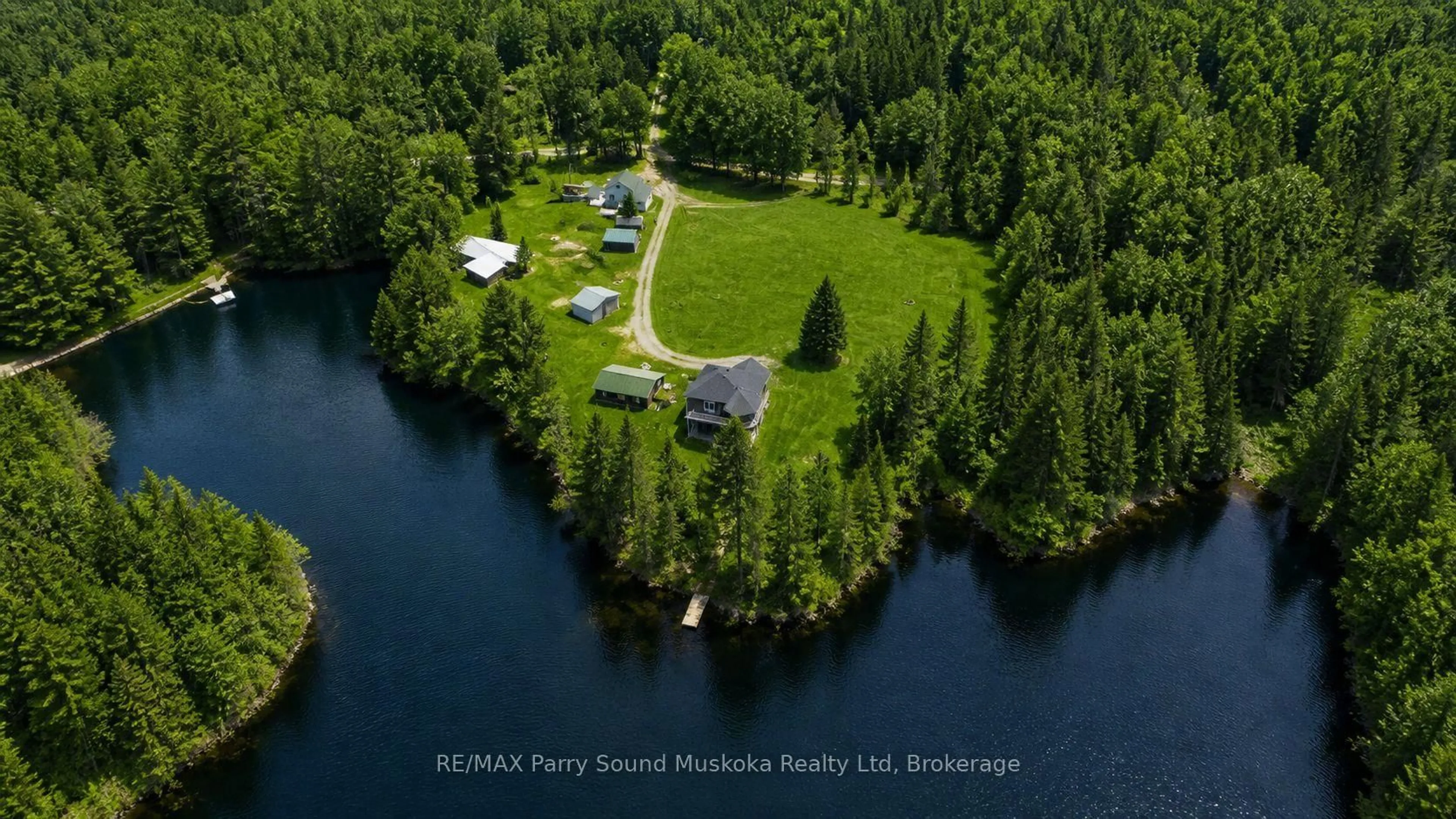 A pic from outside/outdoor area/front of a property/back of a property/a pic from drone, water/lake/river/ocean view for 132 Lawson Dr, Kearney Ontario P0A 1J0