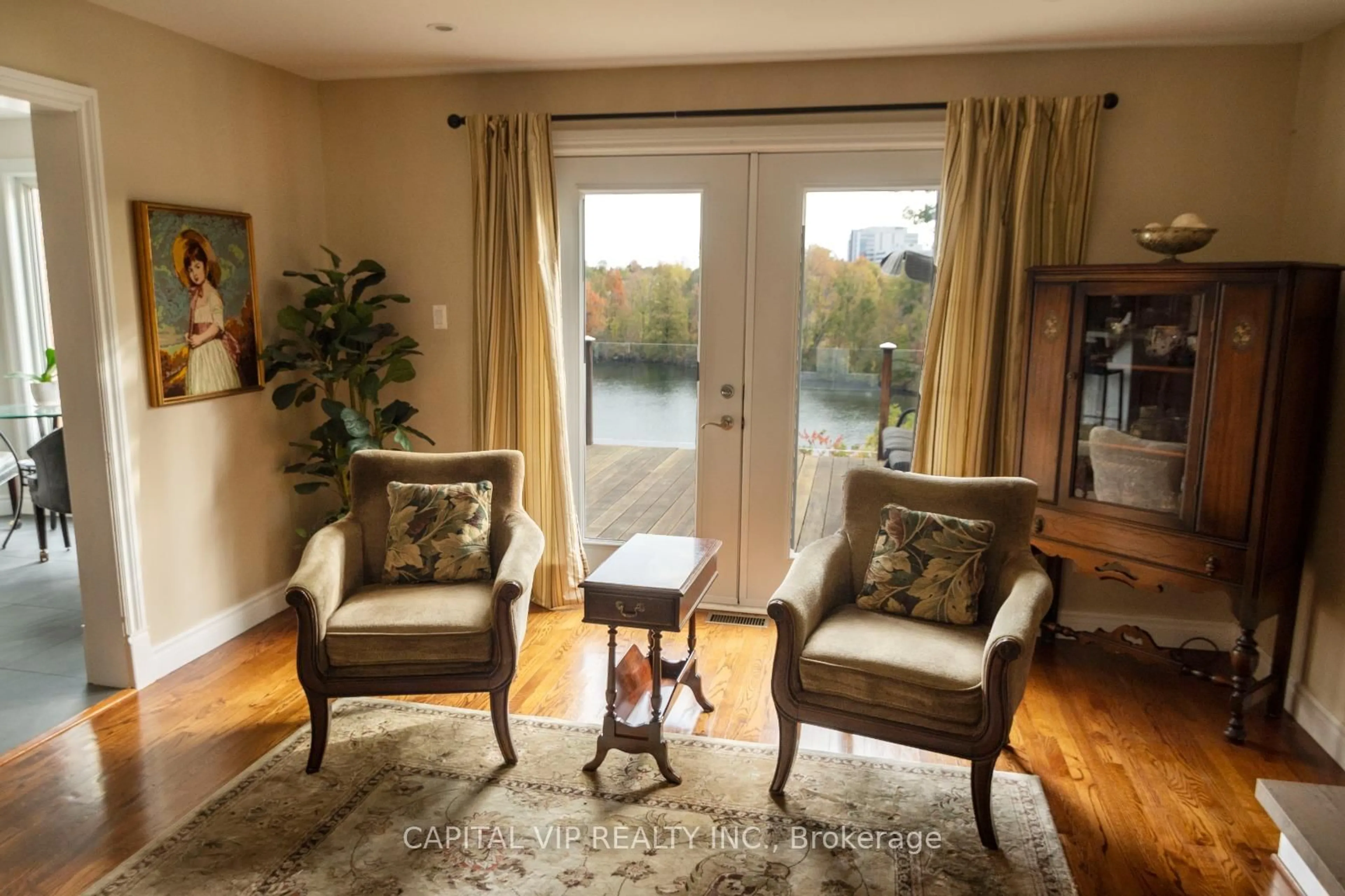 Living room with furniture, wood/laminate floor for 4 Wellsmere Crt, Ottawa Ontario K2E 8C2