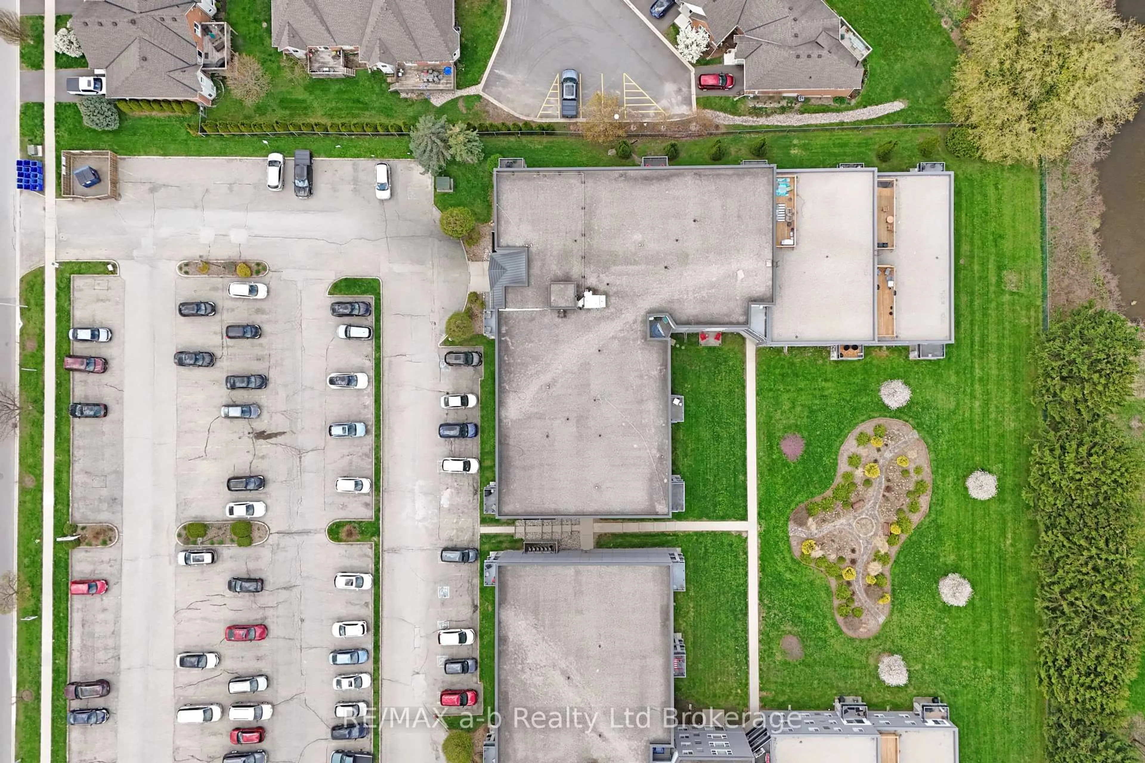 A pic from outside/outdoor area/front of a property/back of a property/a pic from drone, street for 159 Ferguson Dr #304, Woodstock Ontario N4V 1A9