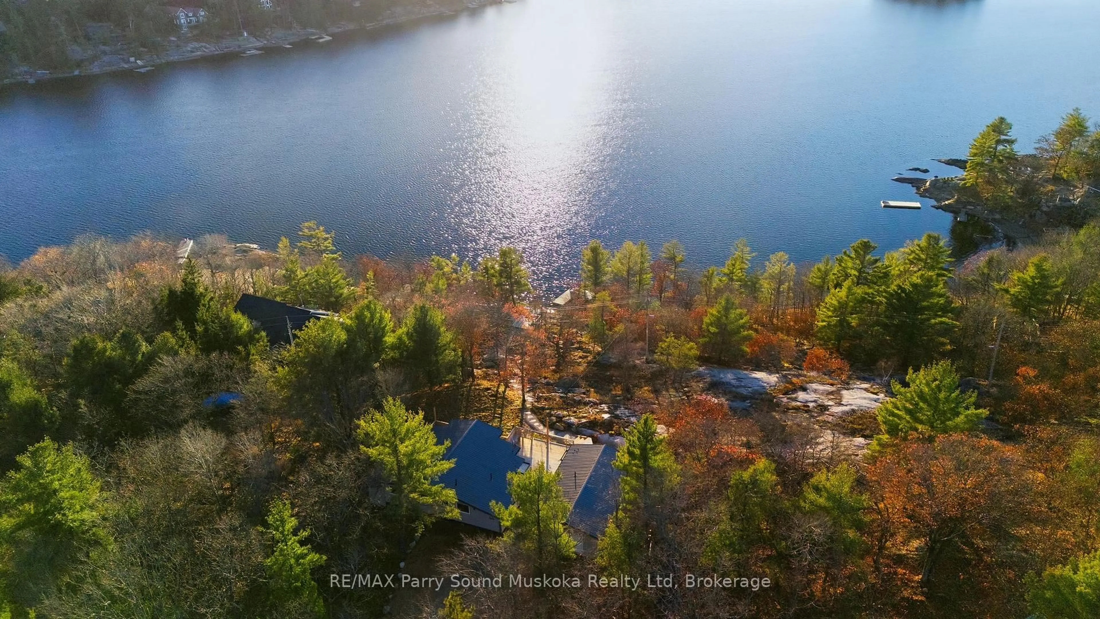 A pic from outside/outdoor area/front of a property/back of a property/a pic from drone, water/lake/river/ocean view for 16 Hillside Dr, Carling Ontario P0G 1G0