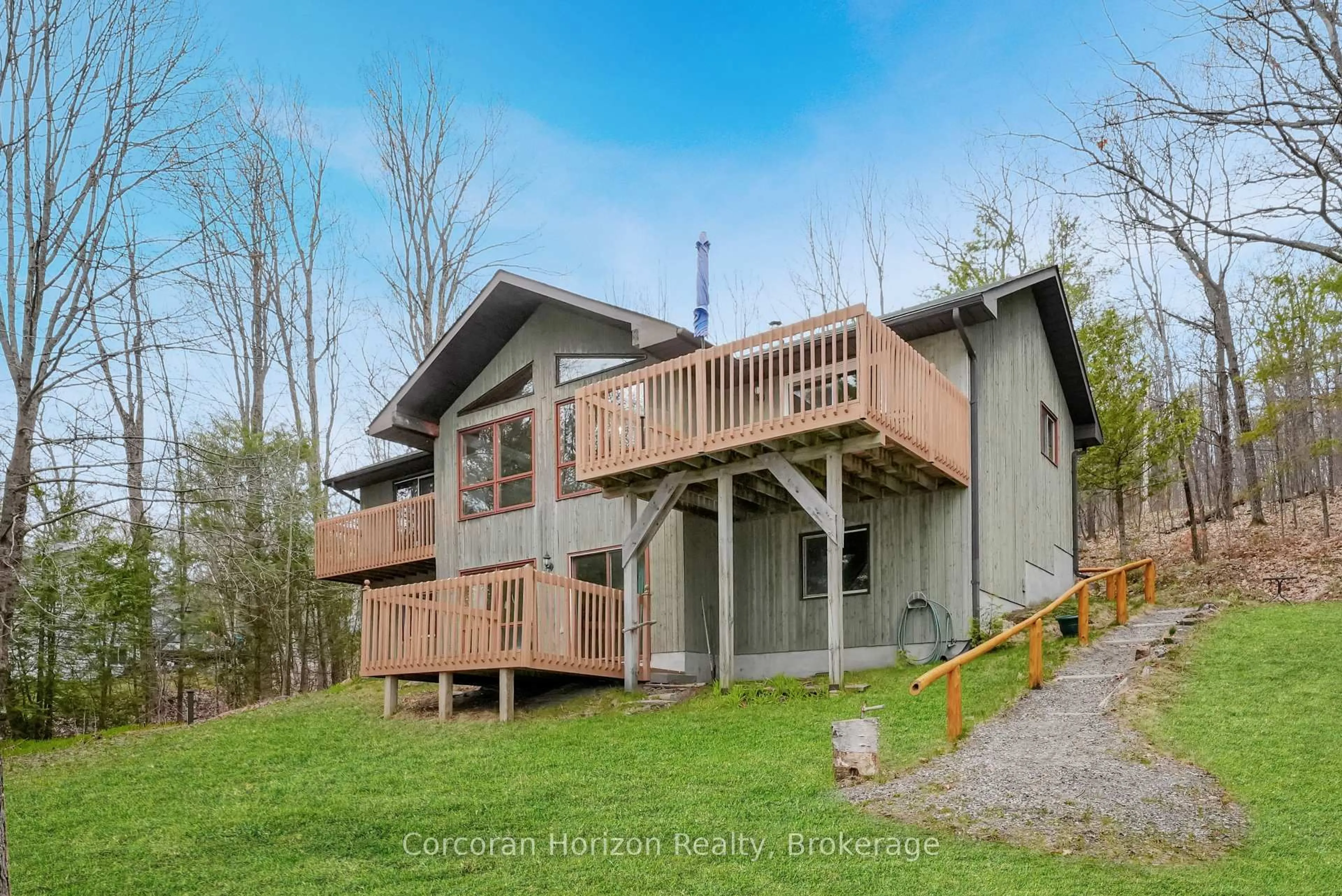 A pic from outside/outdoor area/front of a property/back of a property/a pic from drone, water/lake/river/ocean view for 1230 Journey's End Tr, Highlands East Ontario K0M 1S0