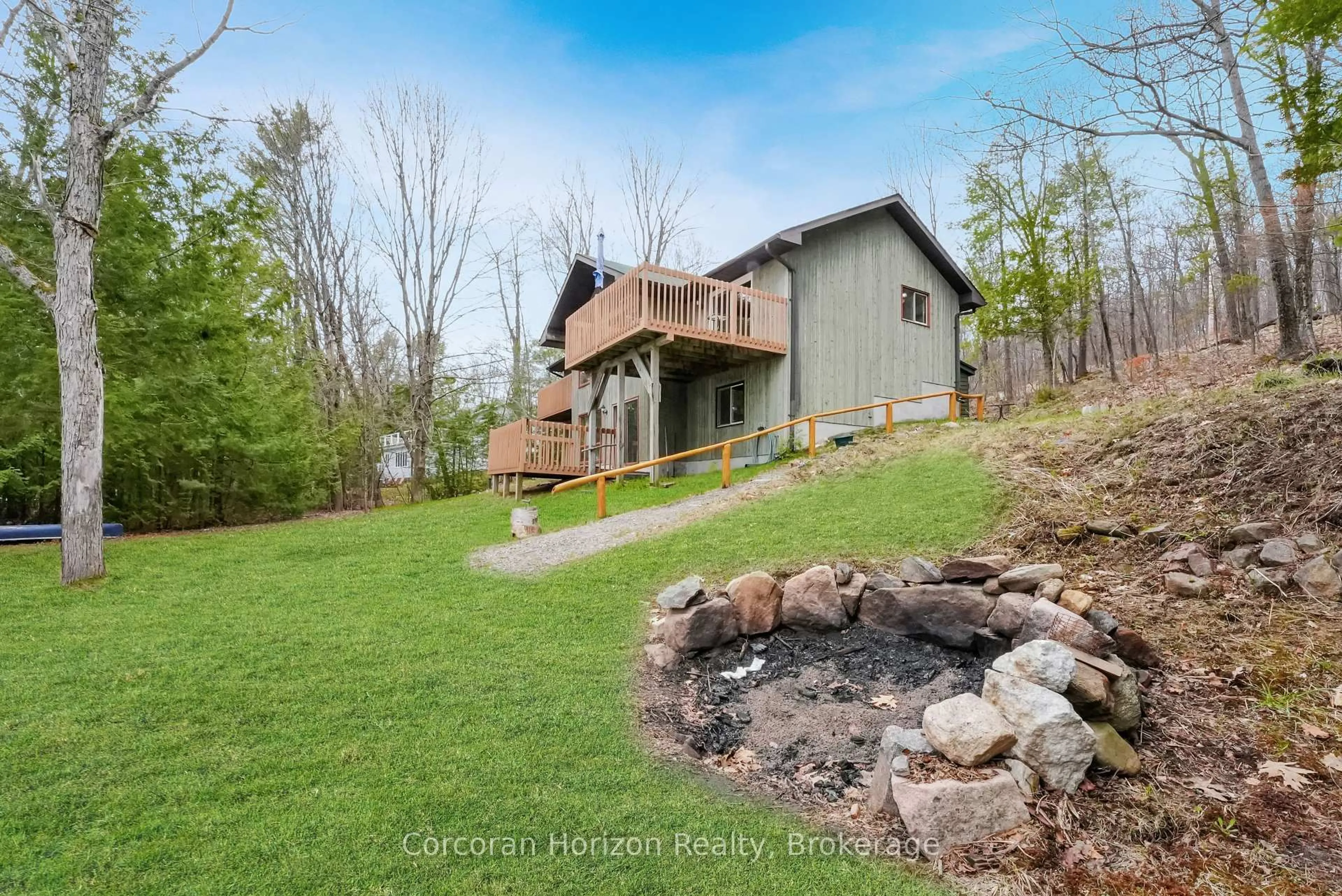 A pic from outside/outdoor area/front of a property/back of a property/a pic from drone, water/lake/river/ocean view for 1230 Journey's End Tr, Highlands East Ontario K0M 1S0