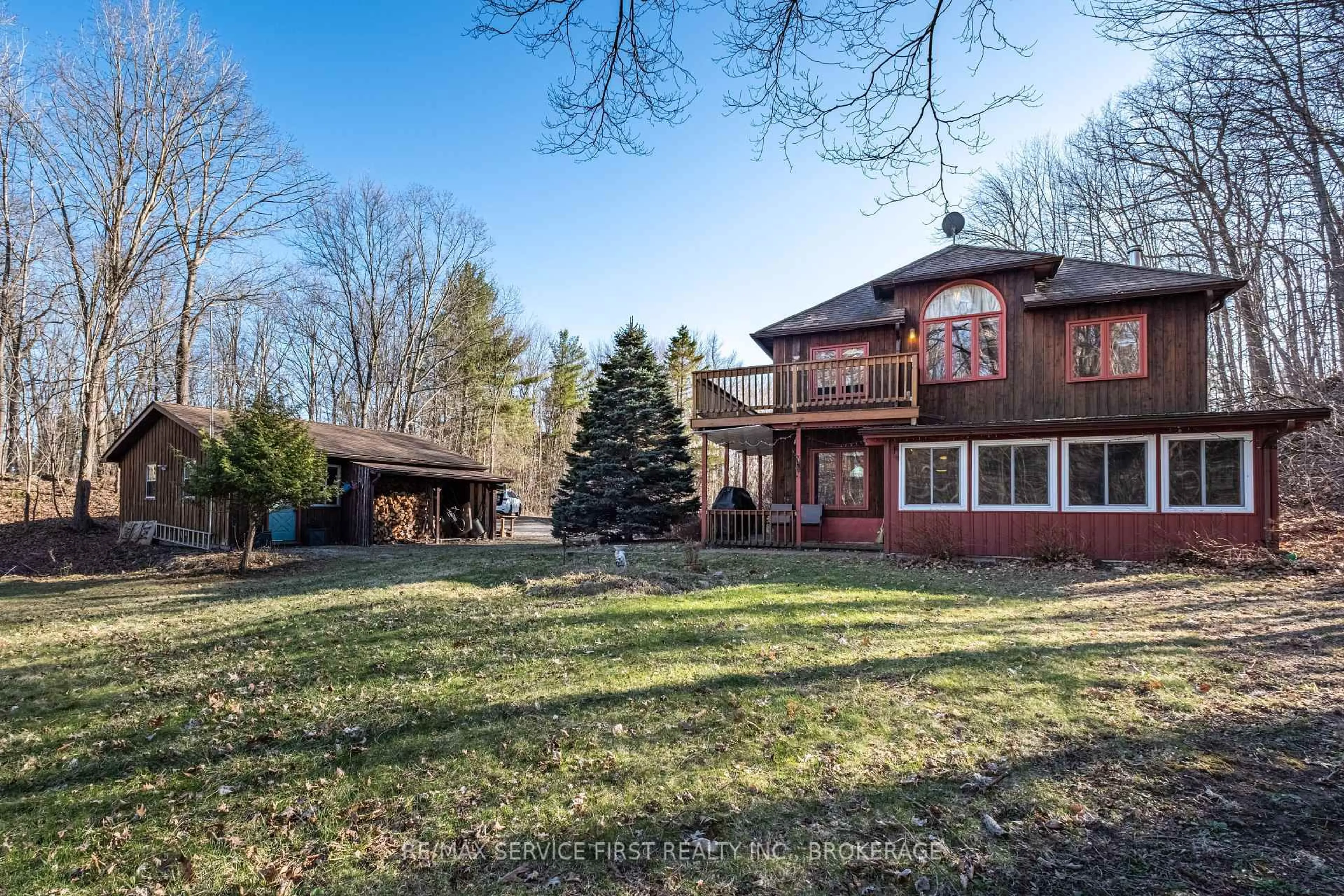 A pic from outside/outdoor area/front of a property/back of a property/a pic from drone, unknown for 13 Pheasant Lane, Hartington Ontario K0H 1W0