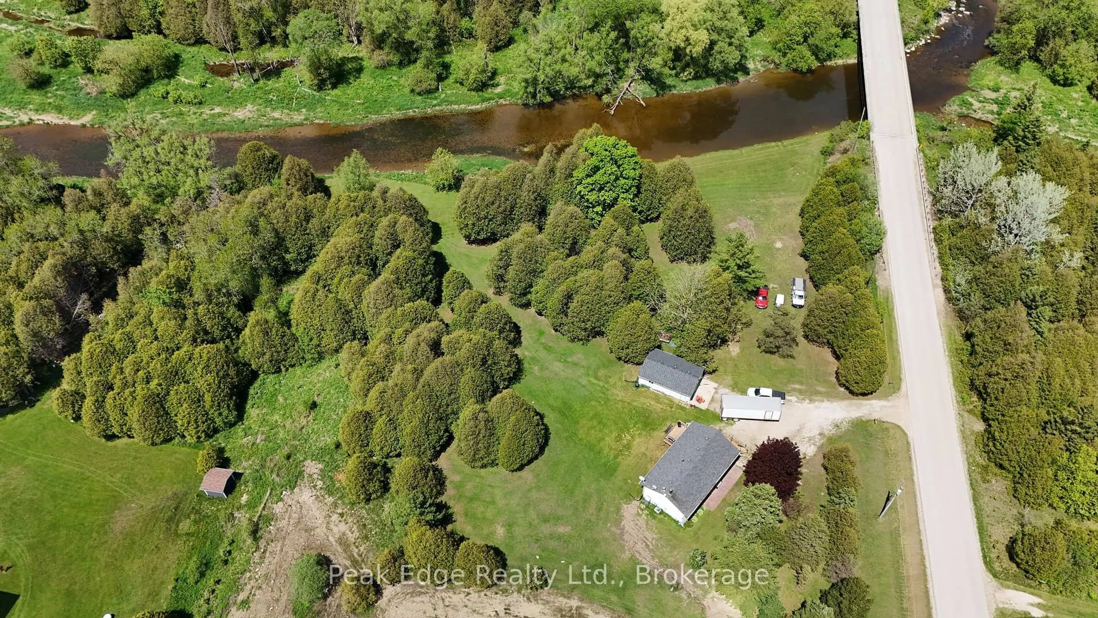 A pic from outside/outdoor area/front of a property/back of a property/a pic from drone, water/lake/river/ocean view for 9840 Baseline Rd, Minto Ontario N0G 1M0