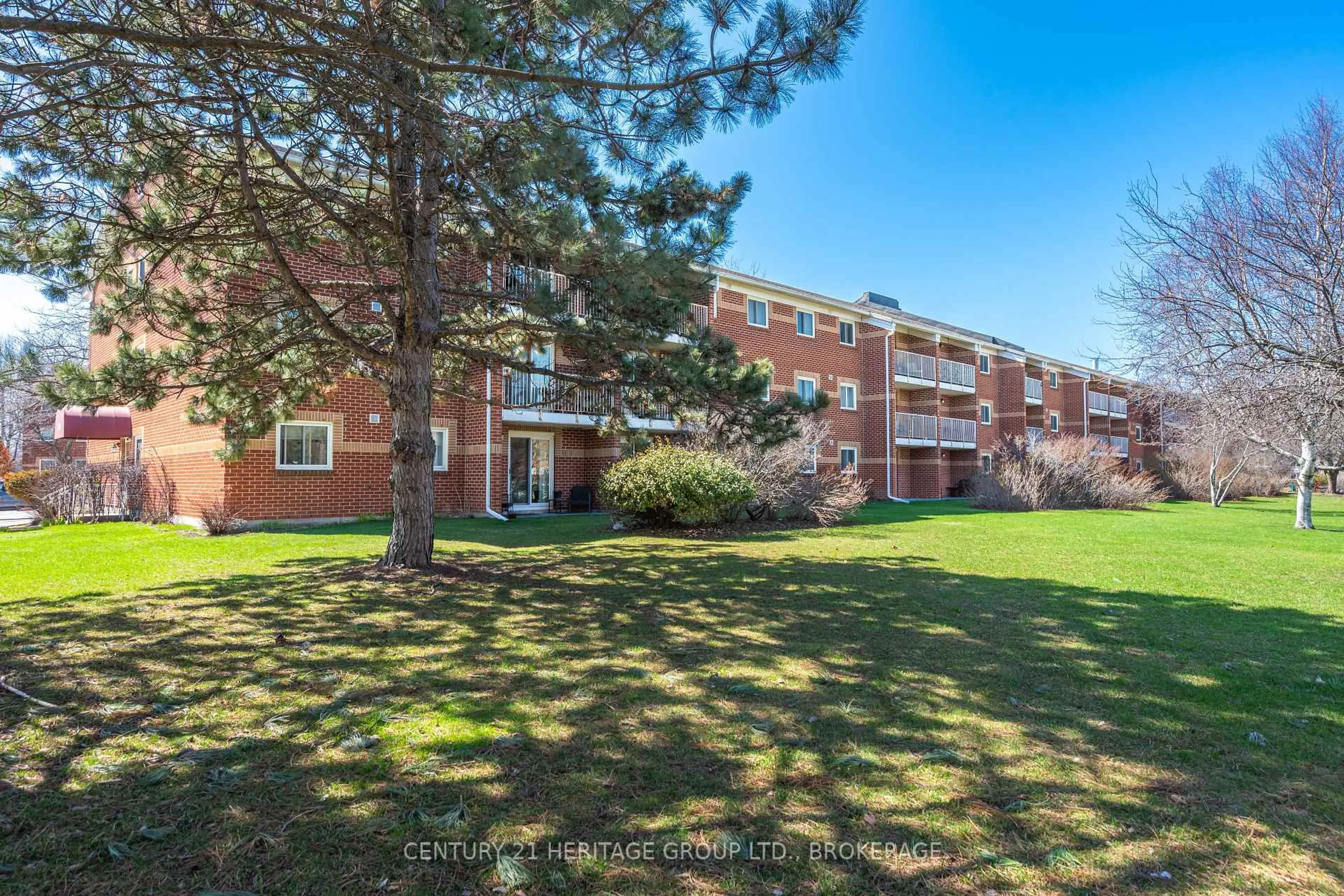 A pic from outside/outdoor area/front of a property/back of a property/a pic from drone, unknown for 573 Armstrong Rd #203, Kingston Ontario K7M 8J8